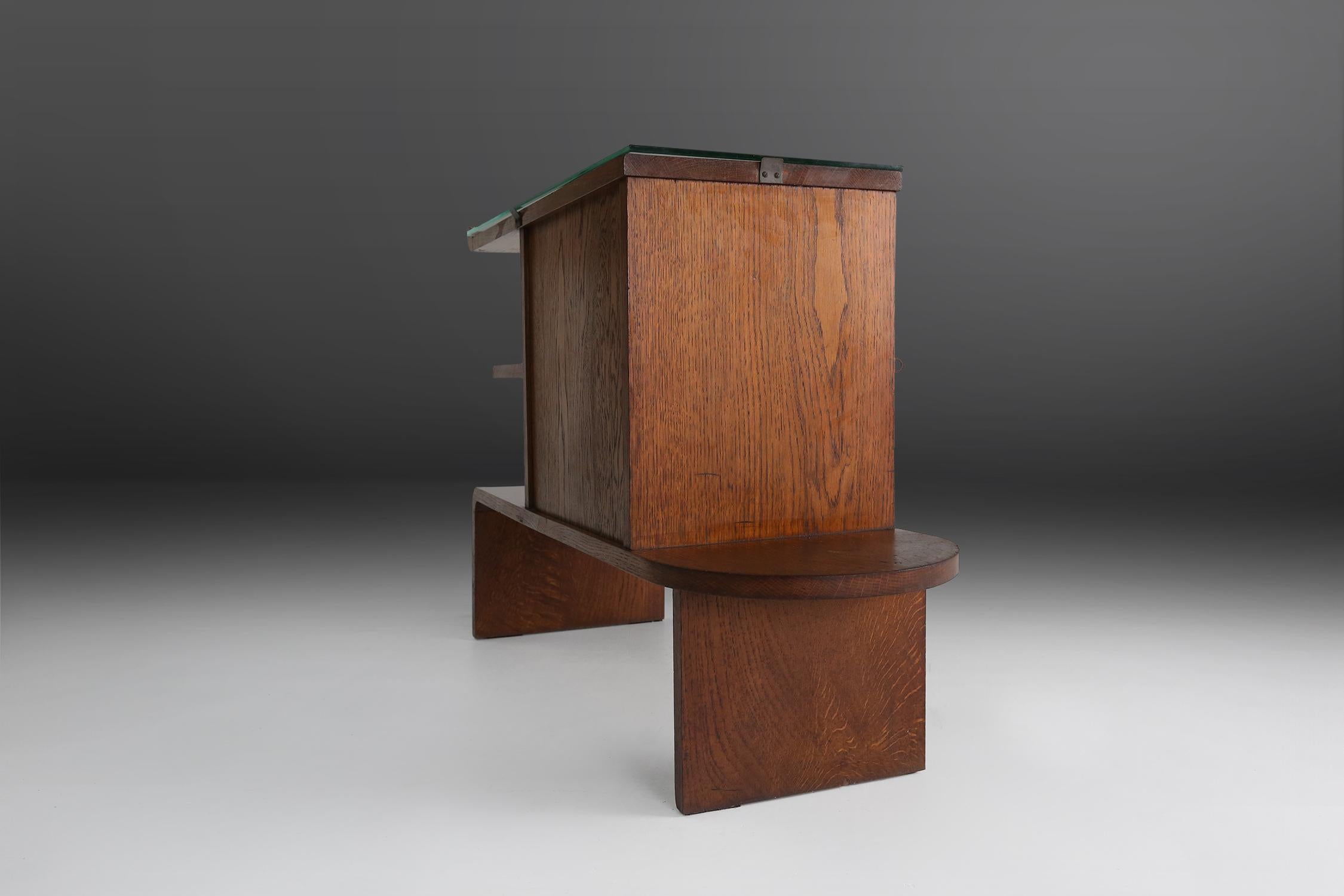 Art Deco cabinet made around the 1930. With a great asymmetric detail in the cabinet.