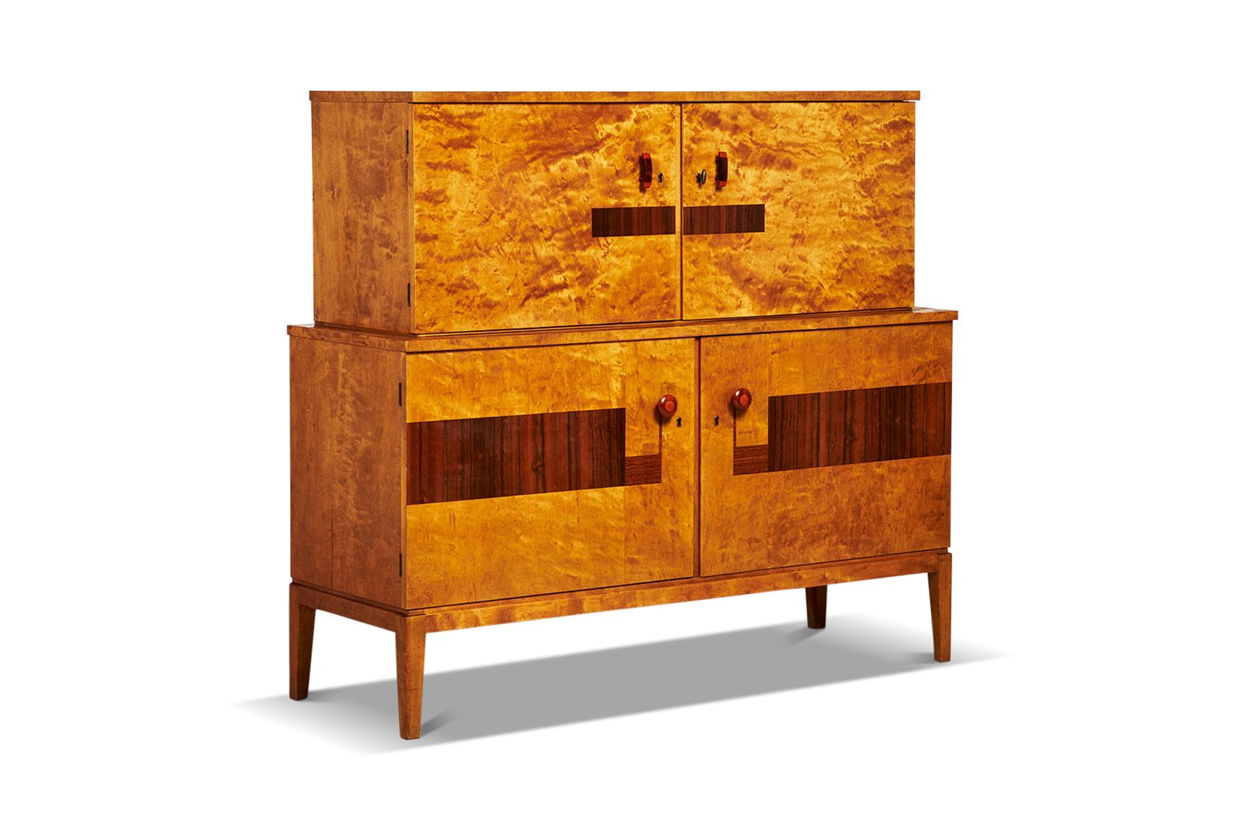 Origin: Sweden
Designer: Unknown
Manufacturer: Unknown
Era: 1920s
Materials: Birch, Jacaranda, Galalite
Measurements: 56? wide x 19.25? deep x 50.5? tall

Condition: In excellent original condition.
