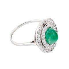 Art Deco Cabochon Cut Emerald & Diamond Halo Ring in Platinum Circa 1920's