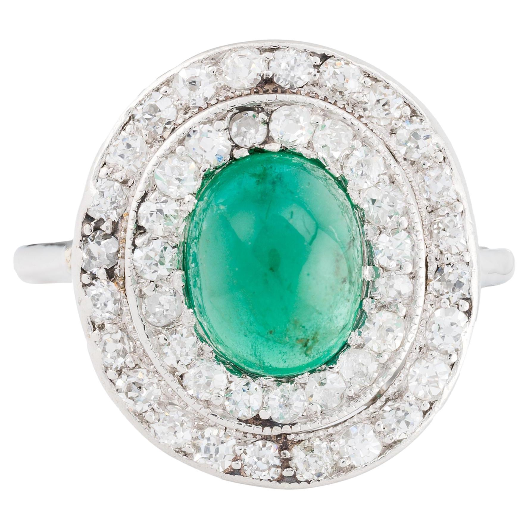 Art Deco Cabochon Cut Emerald & Diamond Halo Ring in Platinum Circa 1920's