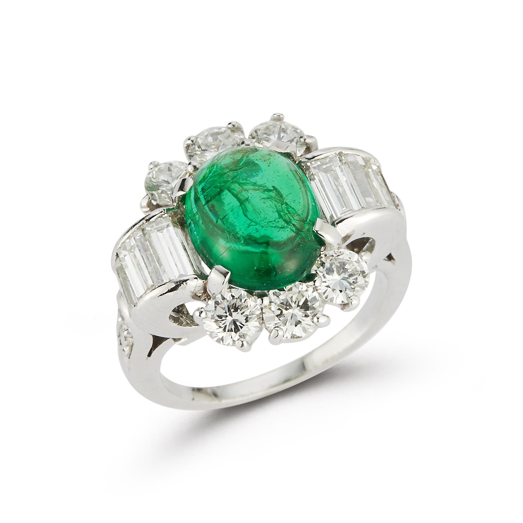 Art Deco Cabochon emerald & Diamond Ring 
Emerald Weight: approximately 2.70 cts
Round Cut Diamond Weight: .90 cts 
Baguette Cut Diamond Weight: .90 cts
Small Round cut Diamond Weight: .12 cts 
Ring size: 3.75
Resizable free of charge
Gold Type: