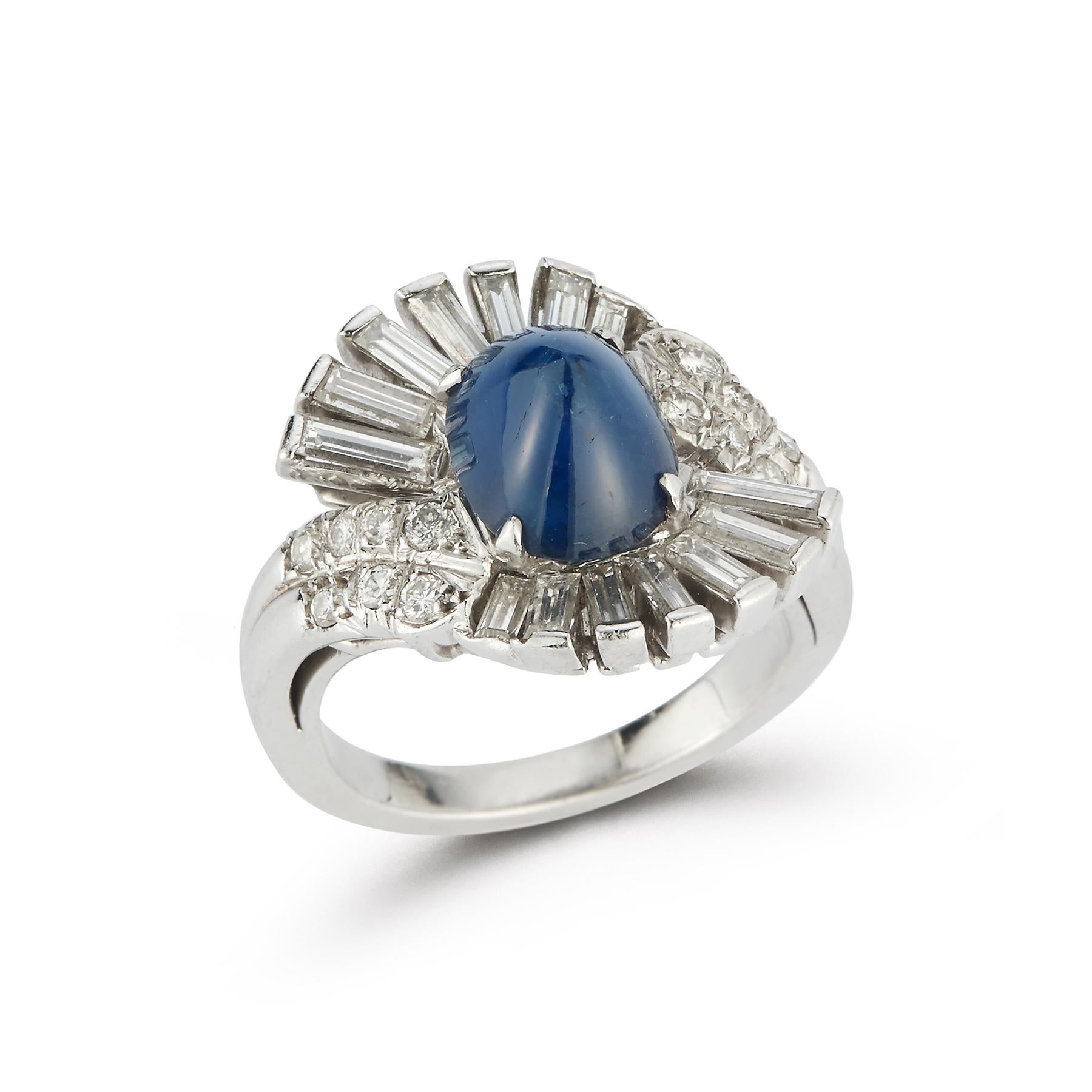 Art Deco Style Cabochon Sapphire & Diamond Cocktail Ring
Sapphire Weight: approximately 4.14 Cts 
Round Diamond Weight: approximately .32 Cts 
Baguette Diamond Weight:.95 Cts
Ring Size: 6.25
Resizable Free of charge 
Gold Type: Platinum
Made circa