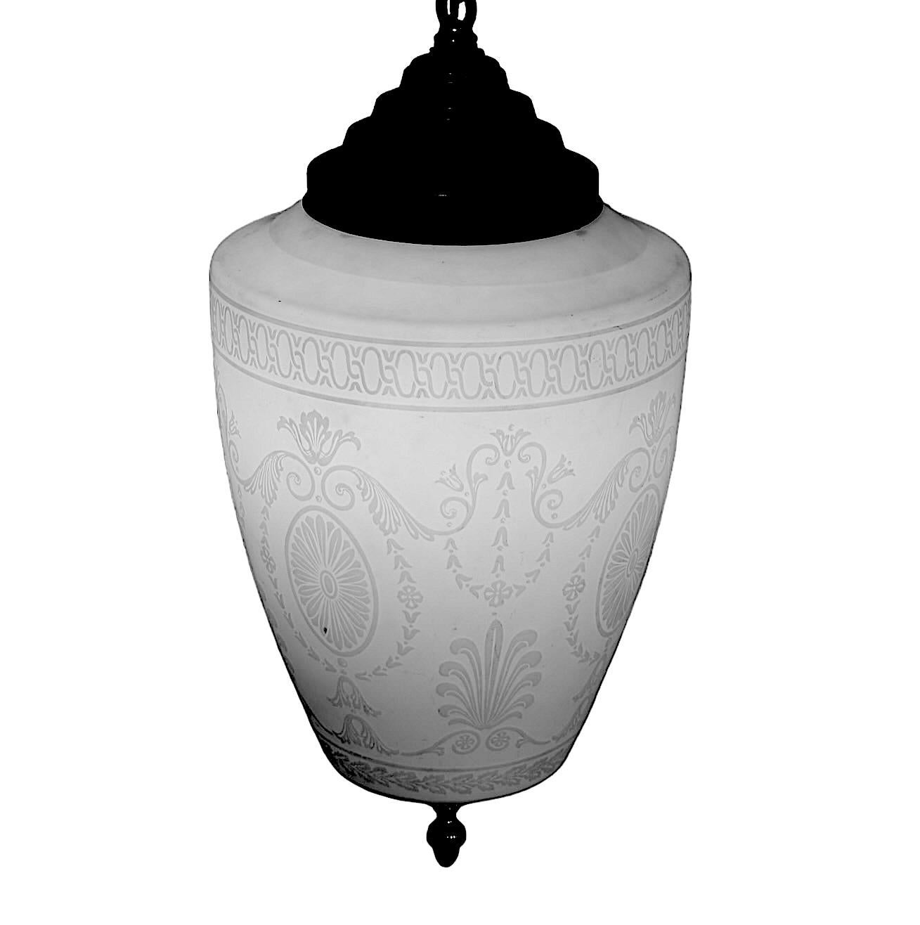 Elegant classical design calcite glass pendant, attributed to Frederick Carder for Steuben, c 1900/1920’s.
The glass globe features an acid cut  back surface, with a classical urn and swag motif, which mounts into the original vintage canopy.
The