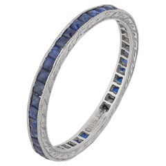 Art Deco calibre cut sapphire platinum eternity band