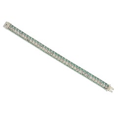 Art Deco Calibre Emerald and Old European-Cut Diamond Strap Bracelet in Platinum