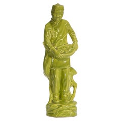 Statuetta in ceramica dello Studio California in stile Art Déco: Ragazzo asiatico con cervo, anni ’40-’50