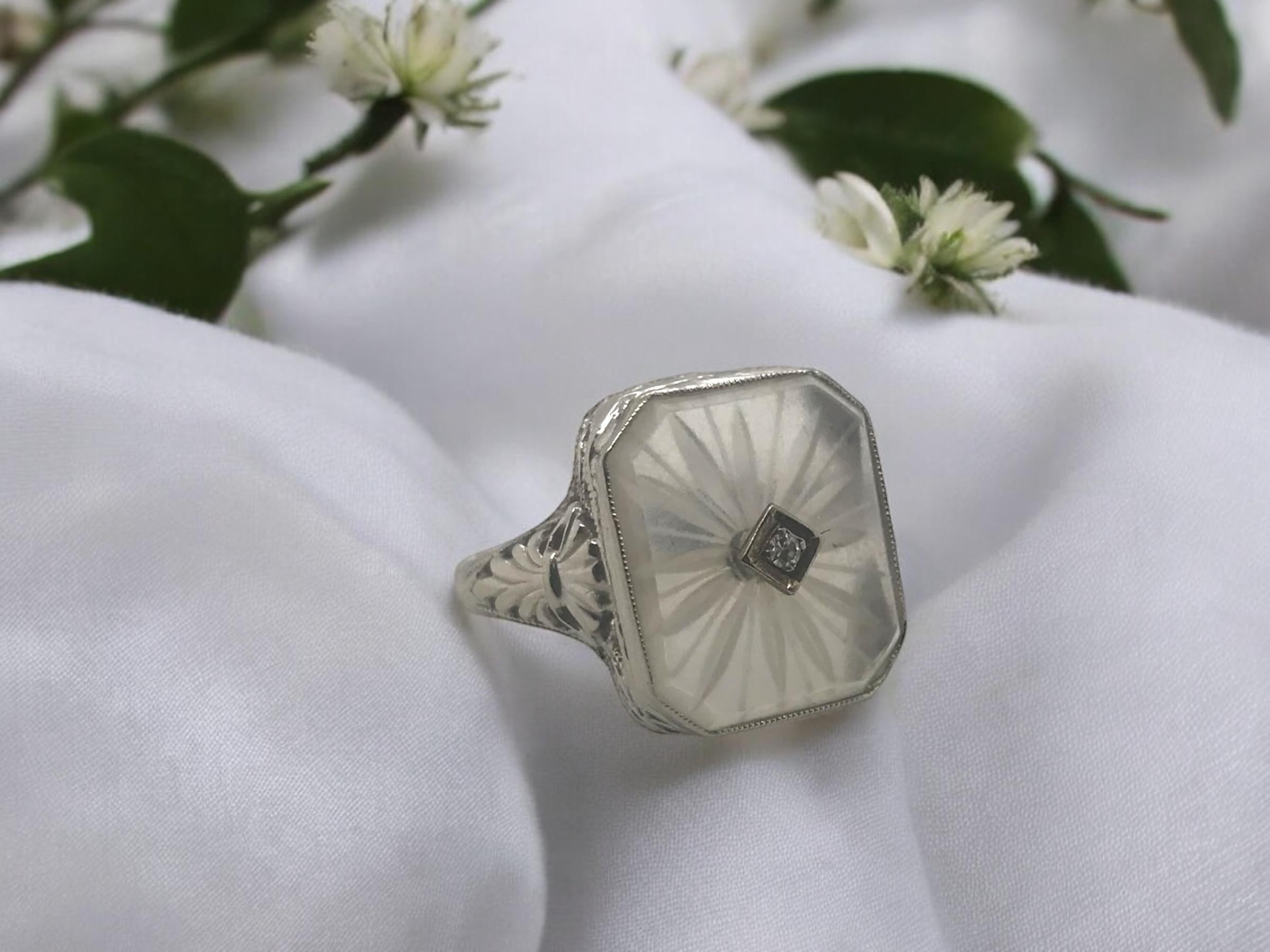 We always love these vintage camphor glass pieces when they come in!

Ring Details
Material: 14K White Gold
Era: Art Deco 1920 - 1940
Head Length: 15mm
Head Width: 13mm
Head Height: 5.5mm
Weight: 4.0 Grams
Finger Size: 6 
Sizable upon