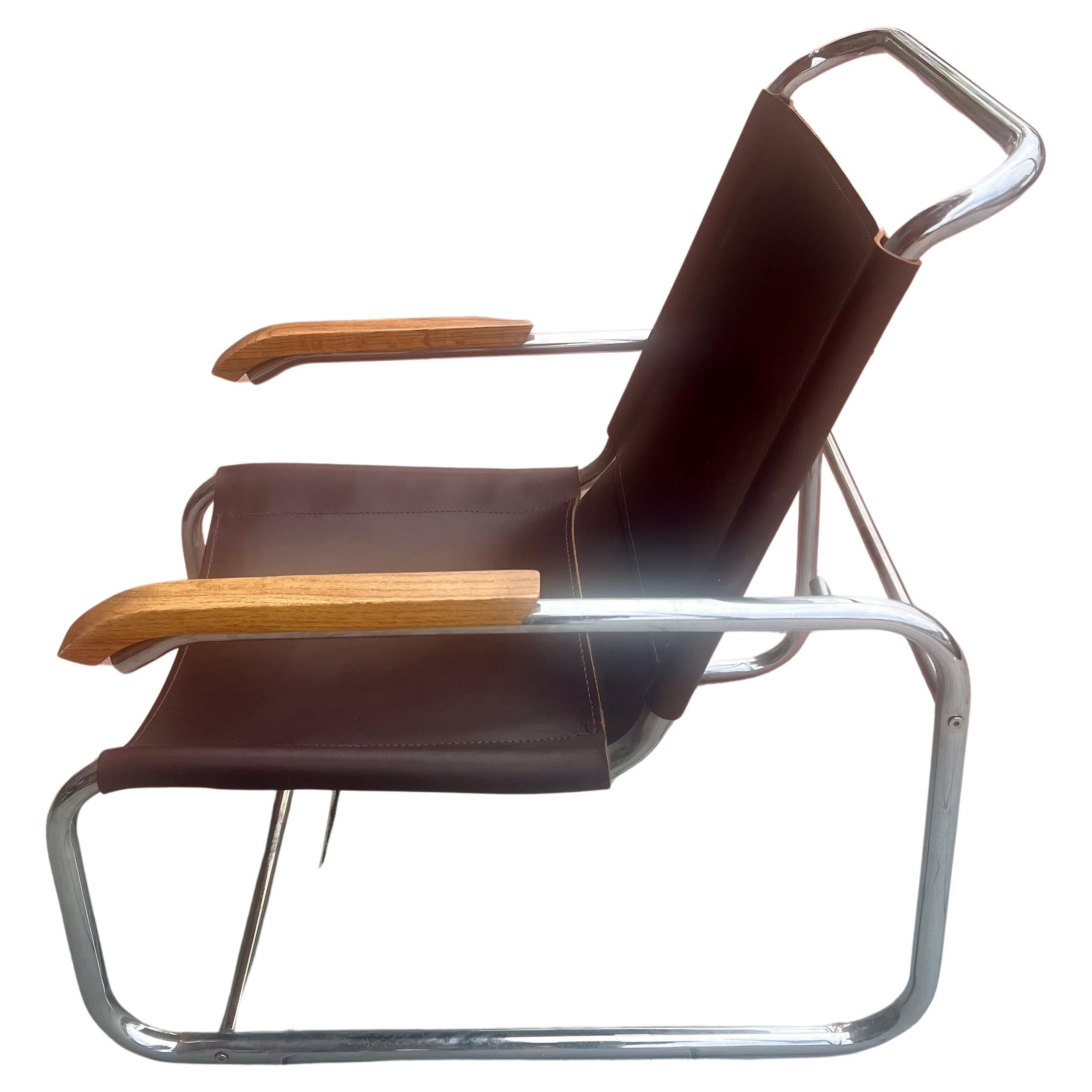 Original 1960s cantilever Marcel Breuer B35 brown leather lounge chair with oak wood arm rests. Leather and chrome completly redone . The comfiest and most stylish chair you will ever sit in. The chair was rechromed we put new leathe and have the