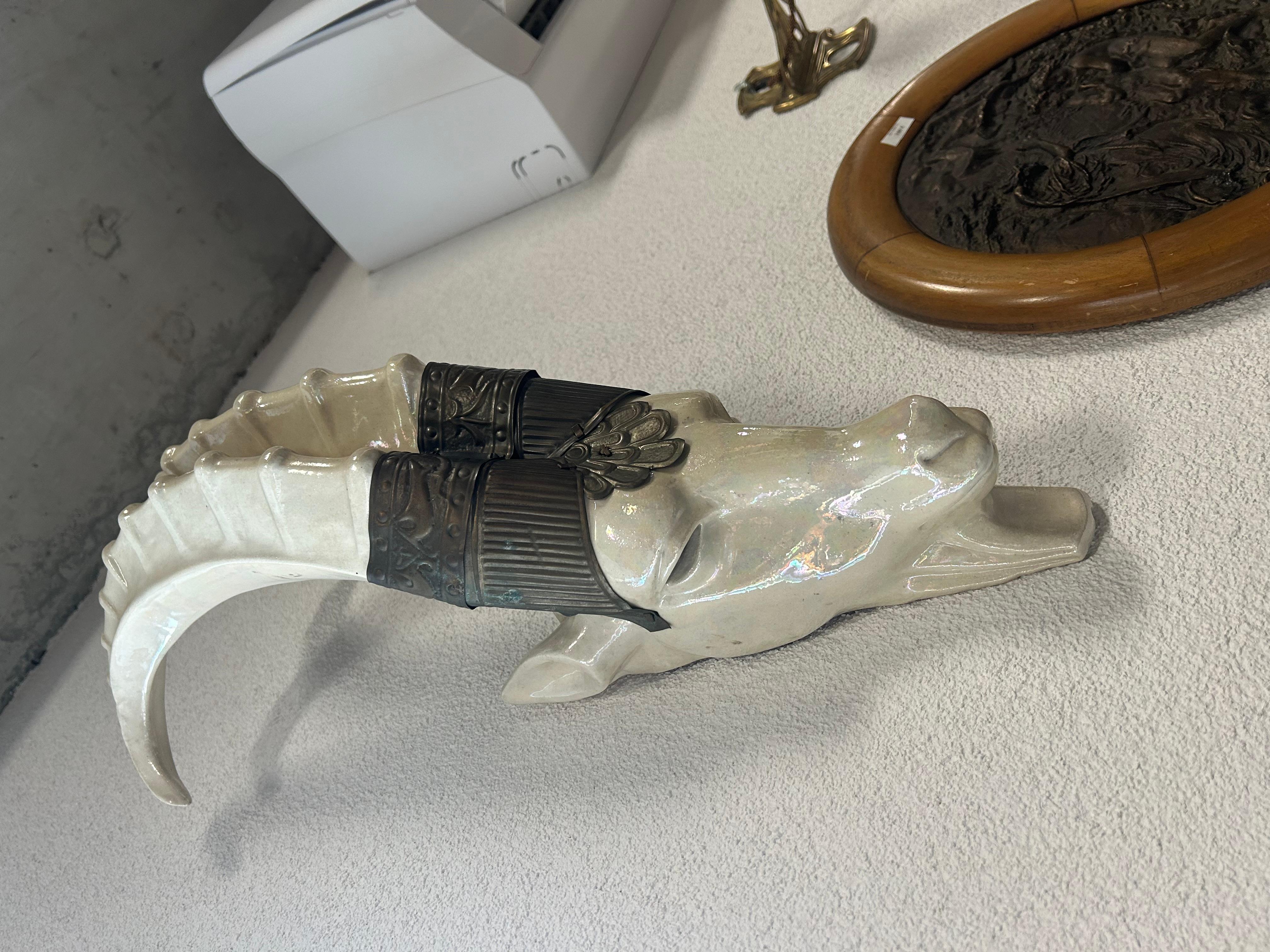 Art deco capricorn wall lamp in very nice original condition.
