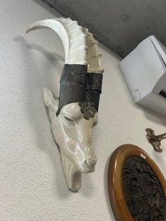 Art deco capricorn wall lamp