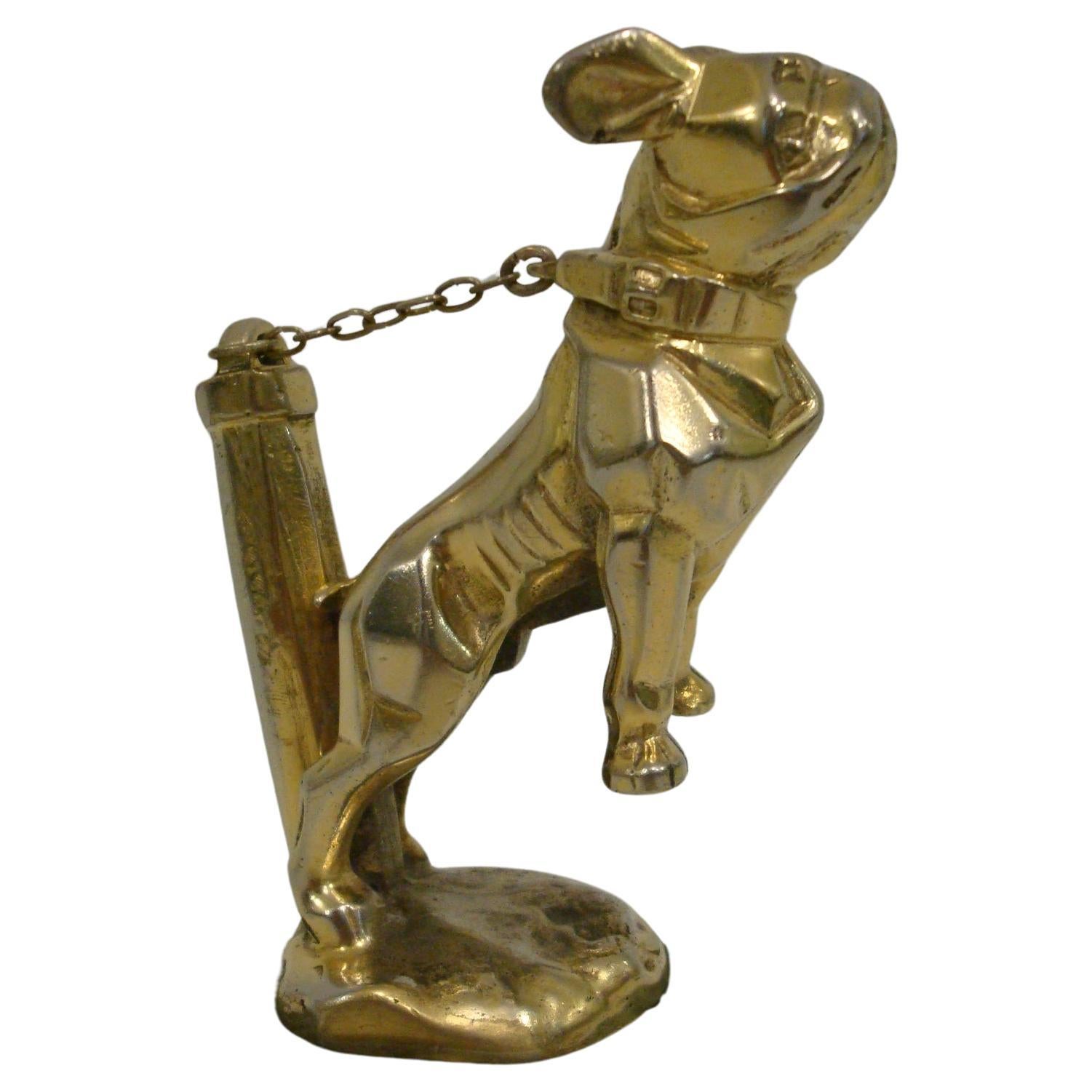 Art Deco 'Chained Bulldog' Car Mascot / Hood Ornament designed by Marvel, French, 1920´s, silver-Gilt plated bronze, small version, 14cm long, complete with chain. Very nice desk piece of Automobilia.

Some info of similar dogs
Mascottes Passion,