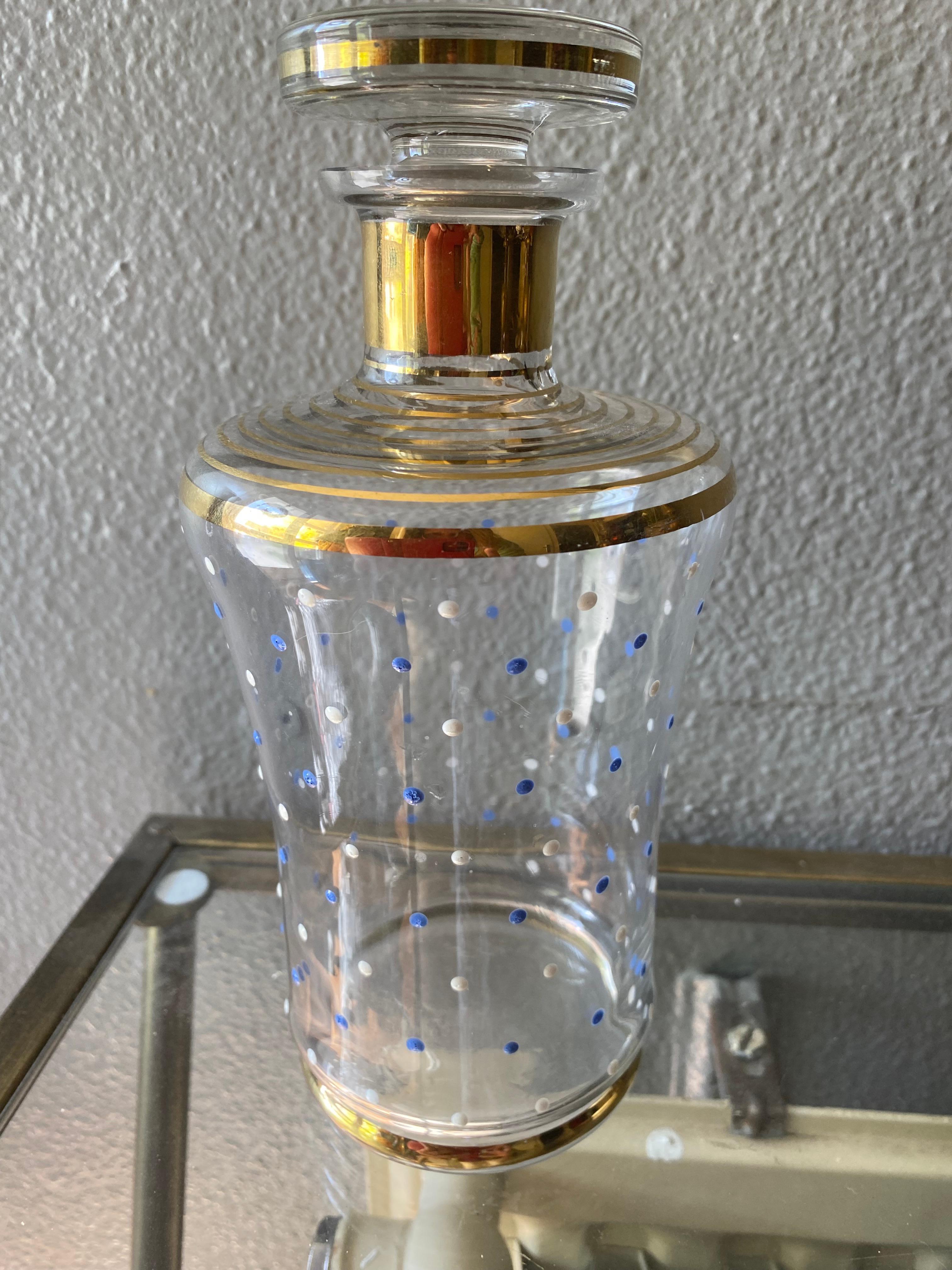 In a good condition beautiful Art Deco carafe with blue and white dots. The carafe is probably from Belgium or France.