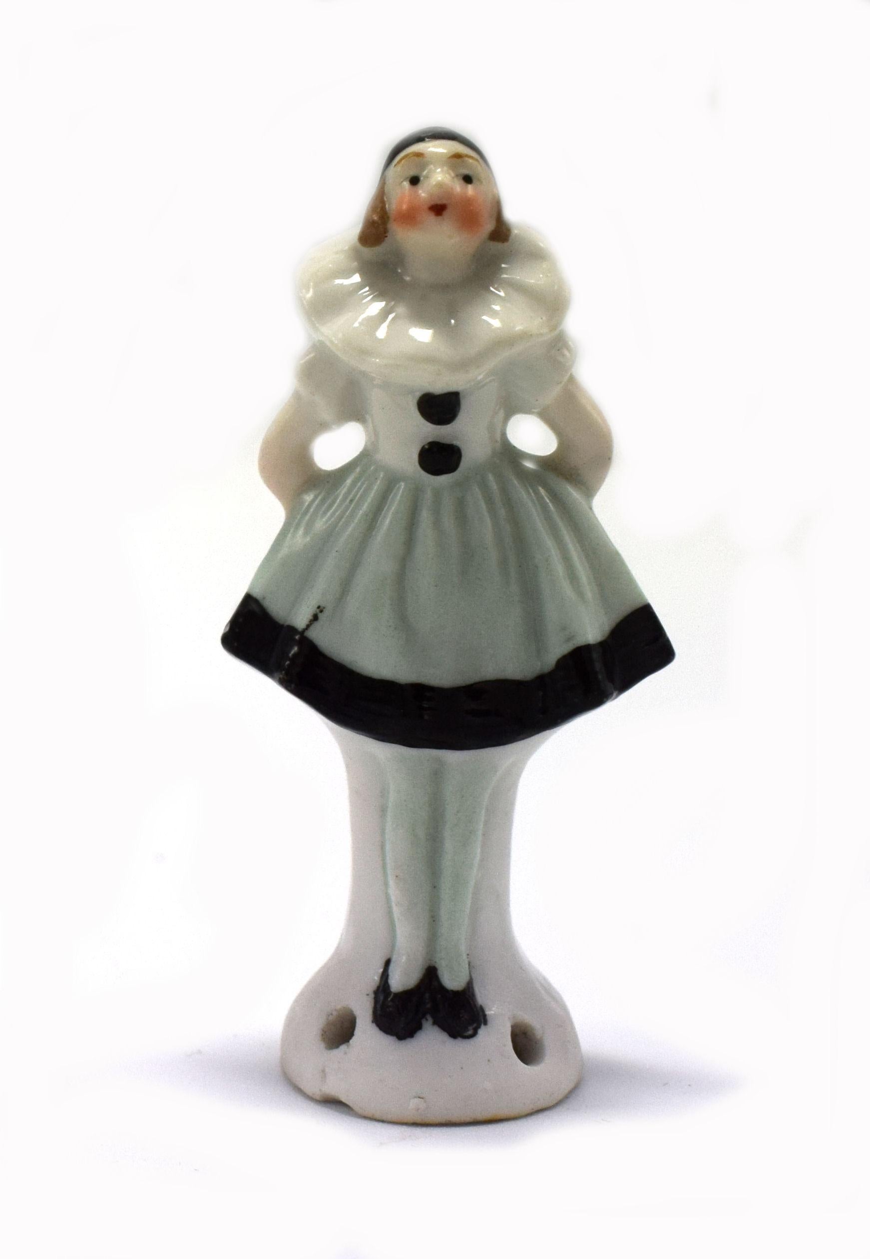 Wonderful 1930s Art Deco and totally charming full figured pin cushion half doll which was manufactured by the German factory of Carl Schneider, she stands a petite 6.7 cm in height. This wonderful little half doll is in the form of a standing girl
