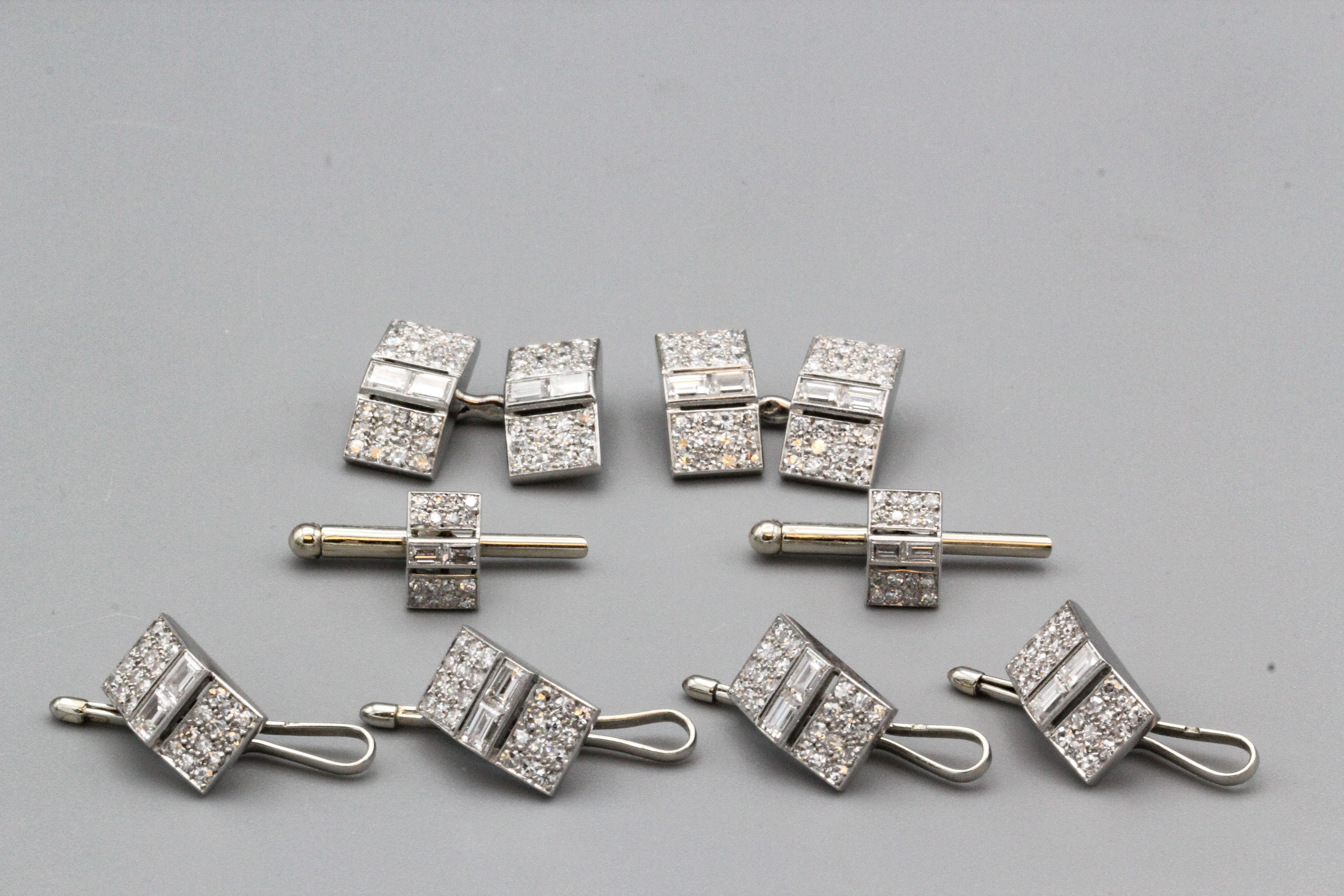 Fine set of Art Deco diamond and platinum cufflinks and studs tuxedo set, by Cartier circa 1920s.  Featuring a pair of cufflinks, four shirt studs, and a pair of collar buttons. 

This Cartier set is a remarkable example of the exquisite