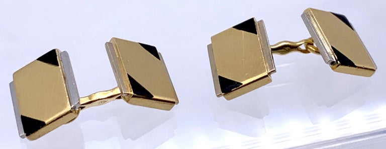 Elegant geometric pair of two colour 18 karat gold cufflinks signed 