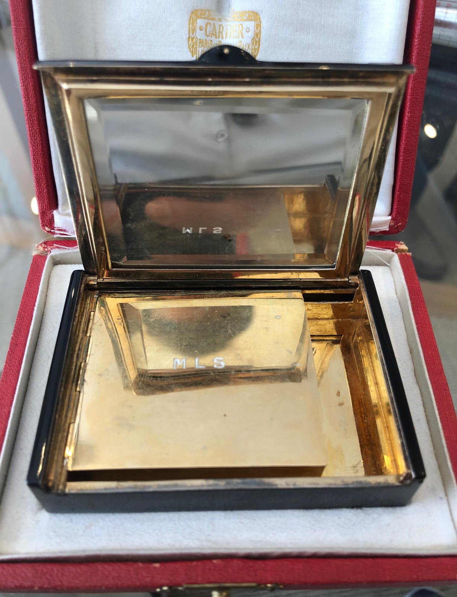 Art Deco Cartier Silver Gilt Enamel and Diamond Compact in Original Fitted Box. This beautifully made box comes in its original fitted box and dates from around 1920.
Free shipping
