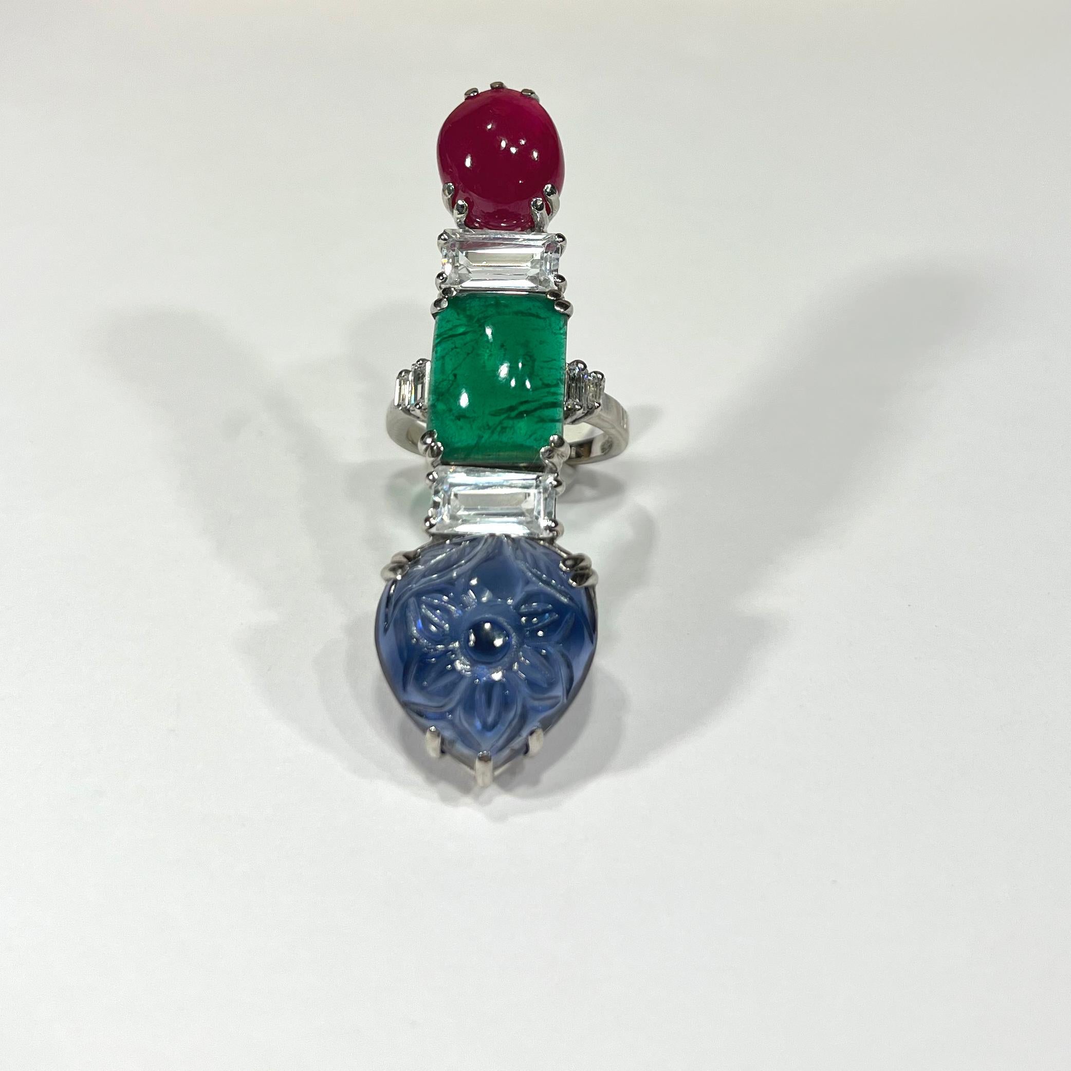 
Art Deco Cartier Style Emerald Fruit Salad Long Cocktail Ring. 
Magnificent copies of the rare and authentic. Lab-grown ruby, diamond, and cabochon emerald measuring 2 inches long by 3/4 inches wide.  Stunning Art Deco looks completely real