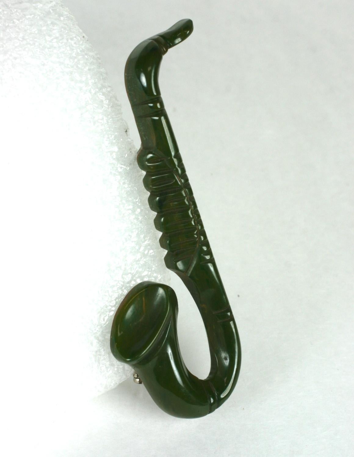 Art Deco Carved Bakelite Saxophone Brooch In Excellent Condition For Sale In New York, NY