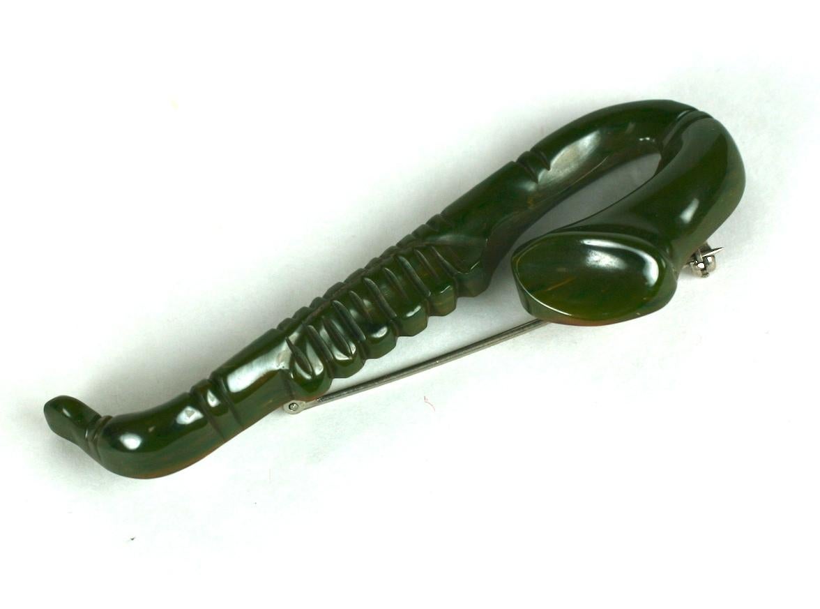 Art Deco Carved Bakelite Saxophone Brooch For Sale 1