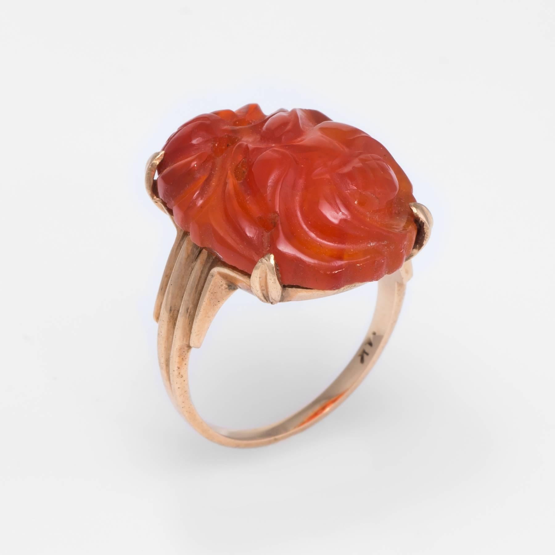 Elegant antique Art Deco era ring (circa 1920s to 1930s), crafted in 14 karat yellow gold. 

Carved carnelian measures 20mm x 18mm.

The ring is in excellent condition. 

Particulars:

Weight: 4.4 grams

Stones:  Carved carnelian measures 20mm x