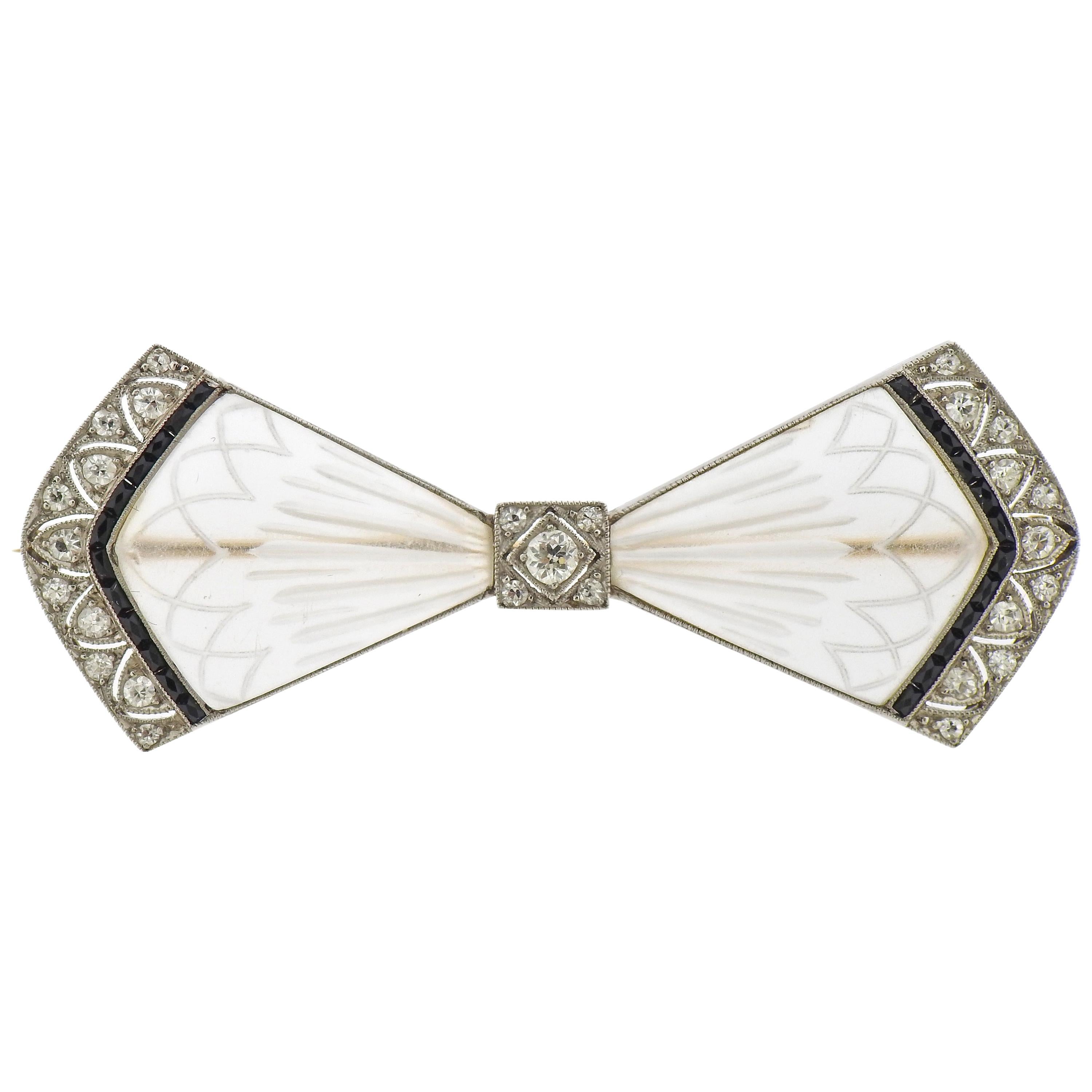 Art Deco Carved Crystal Onyx Diamond Gold Platinum Bow Brooch For Sale