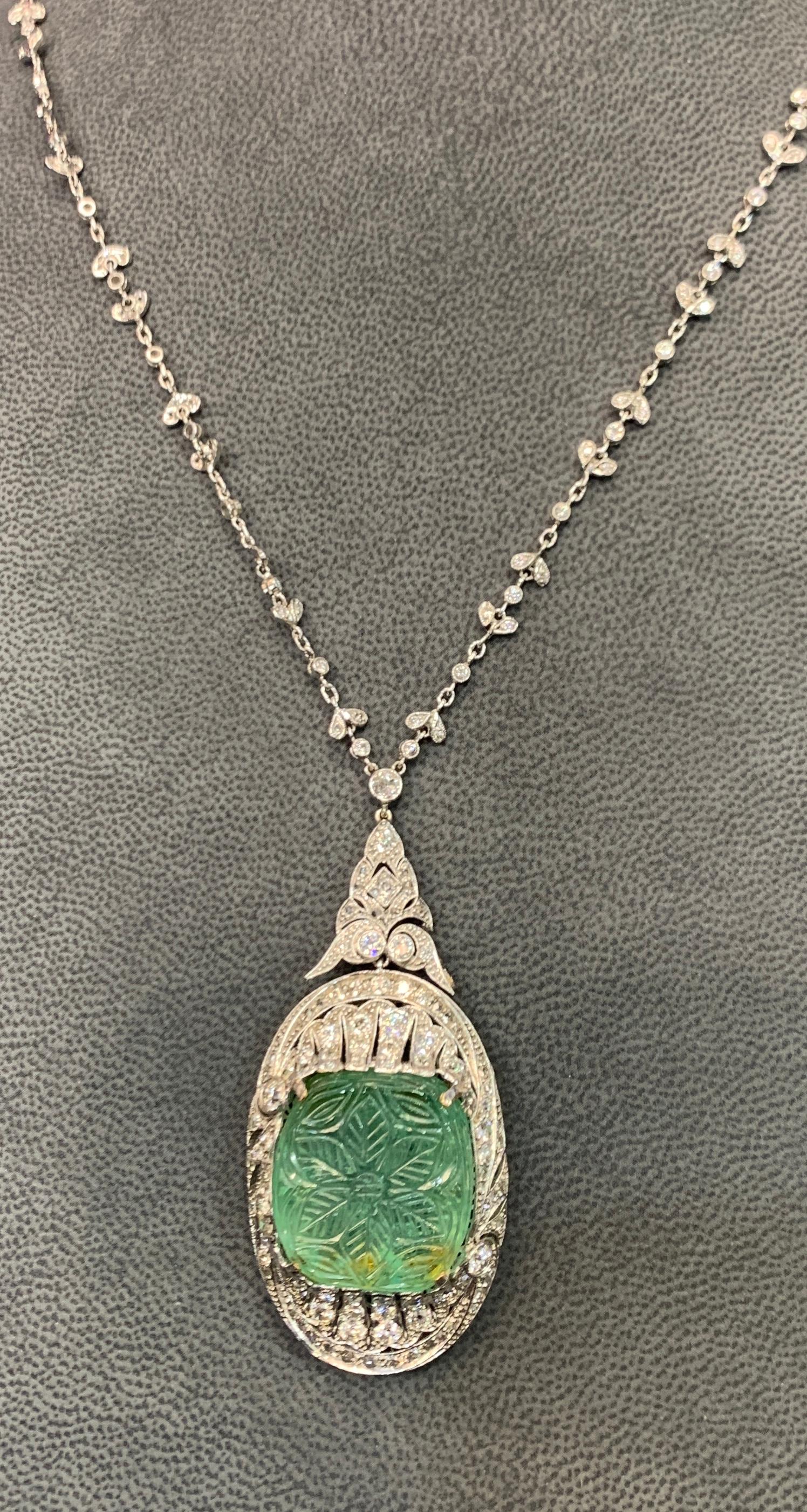 Radiant Cut Art Deco Carved Emerald and Diamond Necklace For Sale