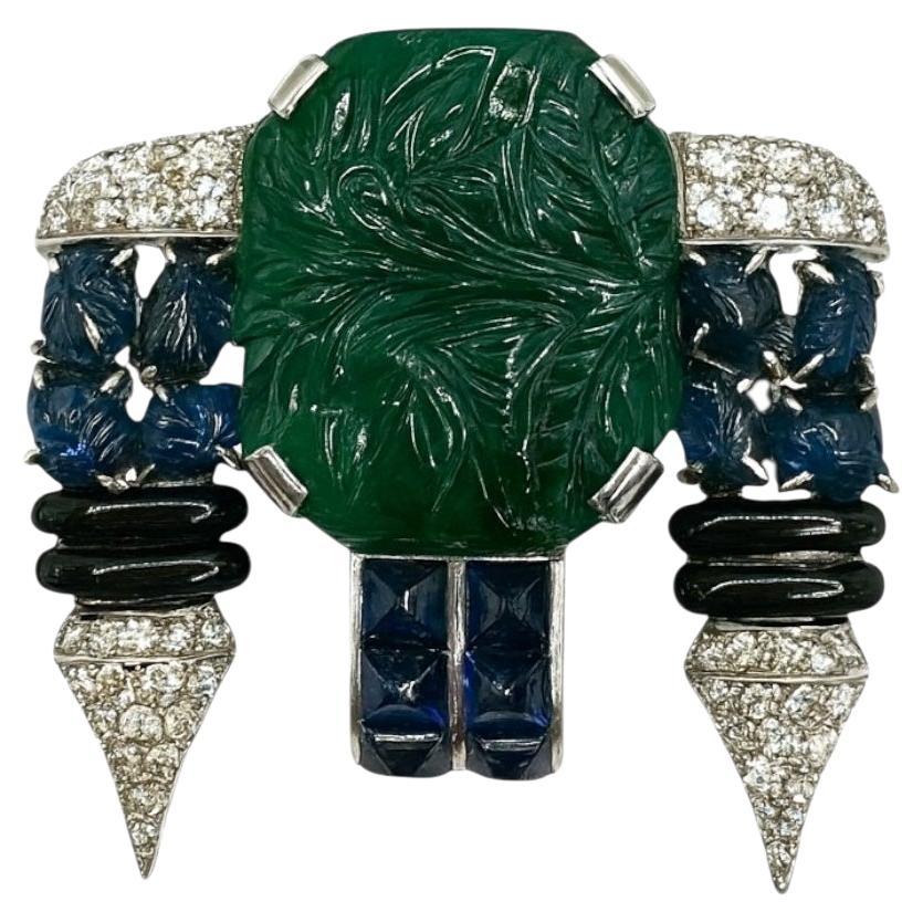 Art Deco Carved Emerald, Sapphire, Onyx
Diamond Brooch