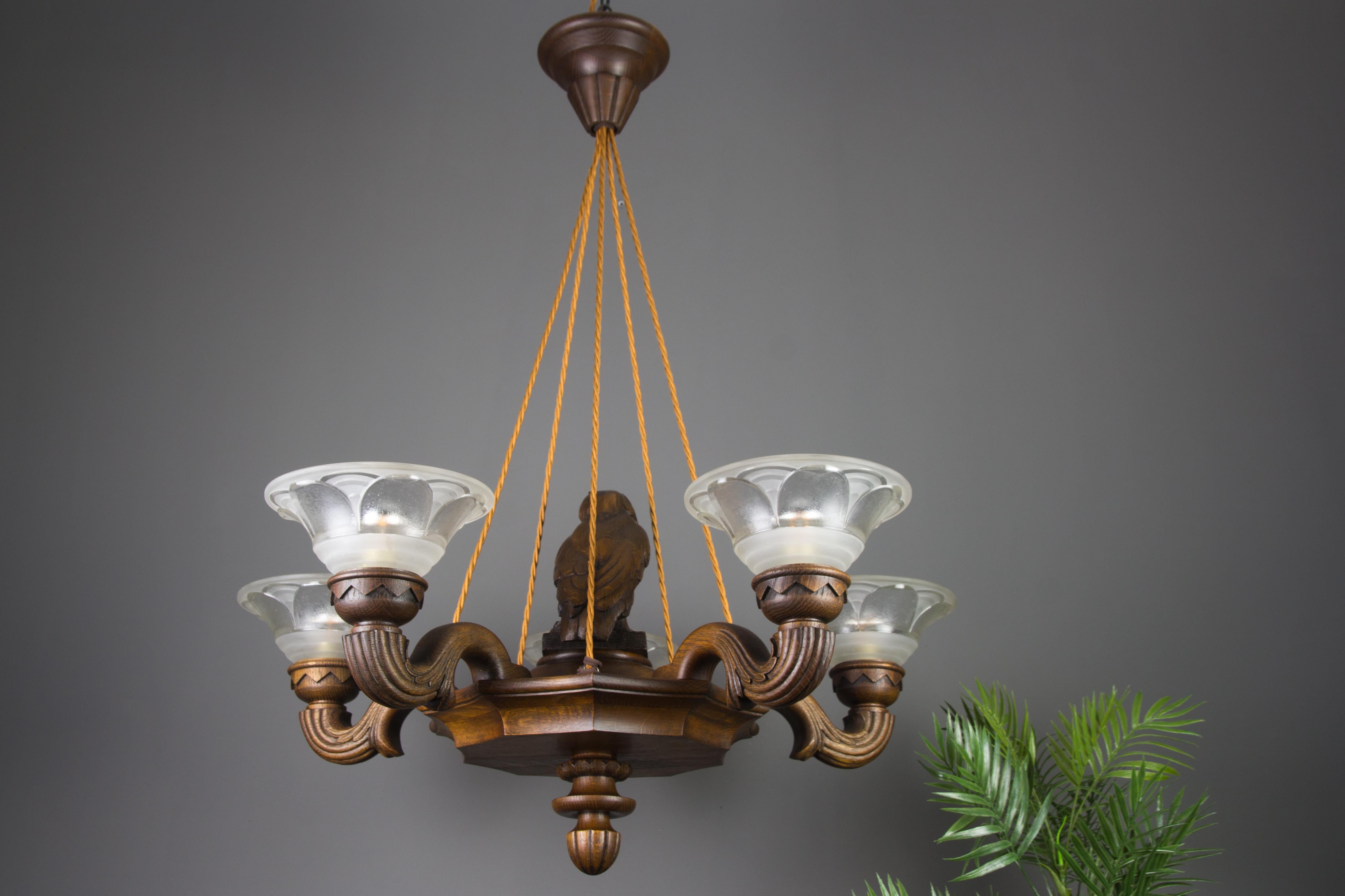 French Art Deco Carved Five-Light Chandelier with Owl Figure and Glass by Ezan, 1920s
