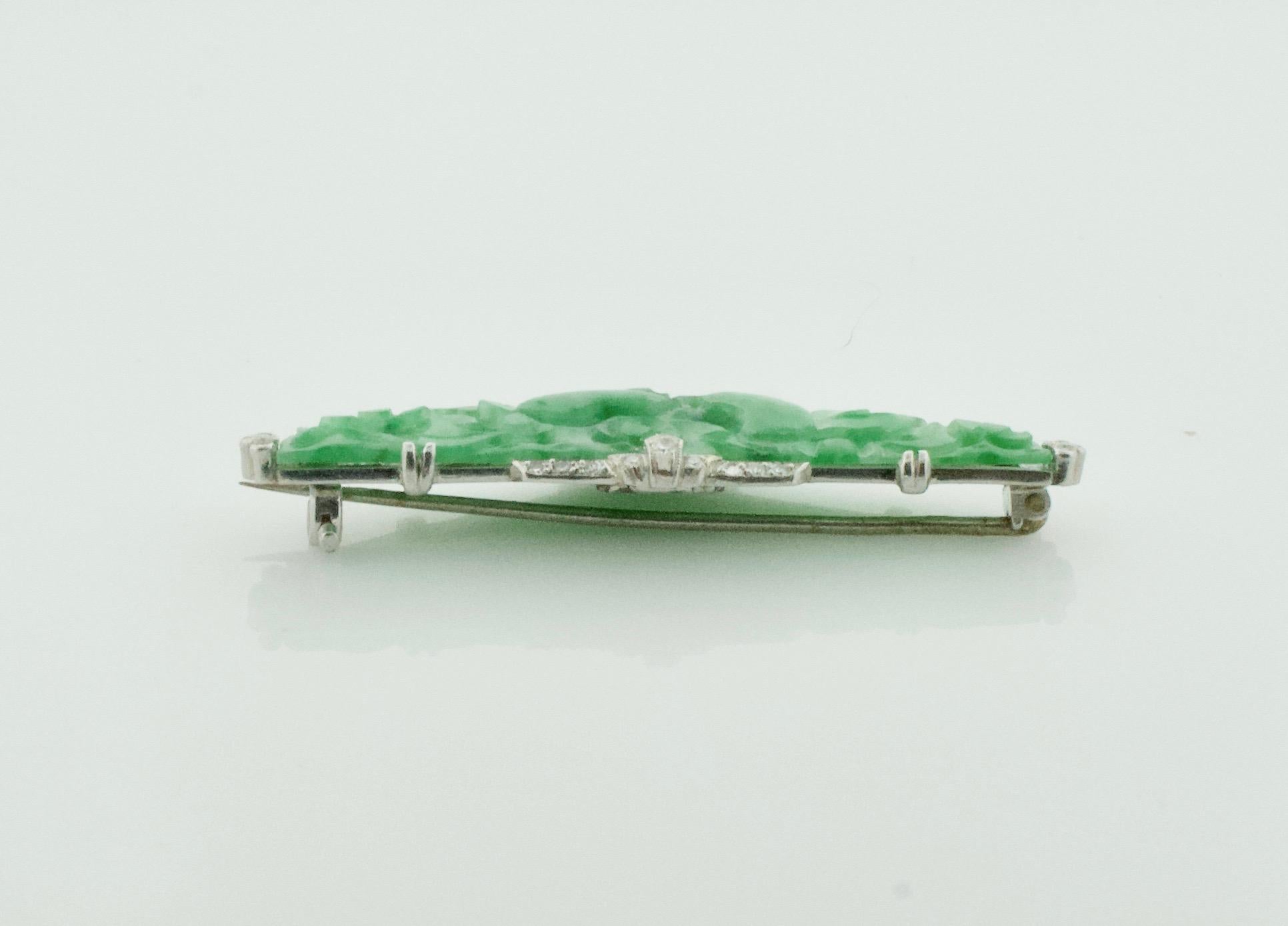 Women's or Men's Art Deco Carved Jade and Diamond Brooch in Platinum, circa 1920s