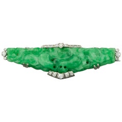 Art Deco Carved Jade and Diamond Brooch in Platinum, circa 1920s