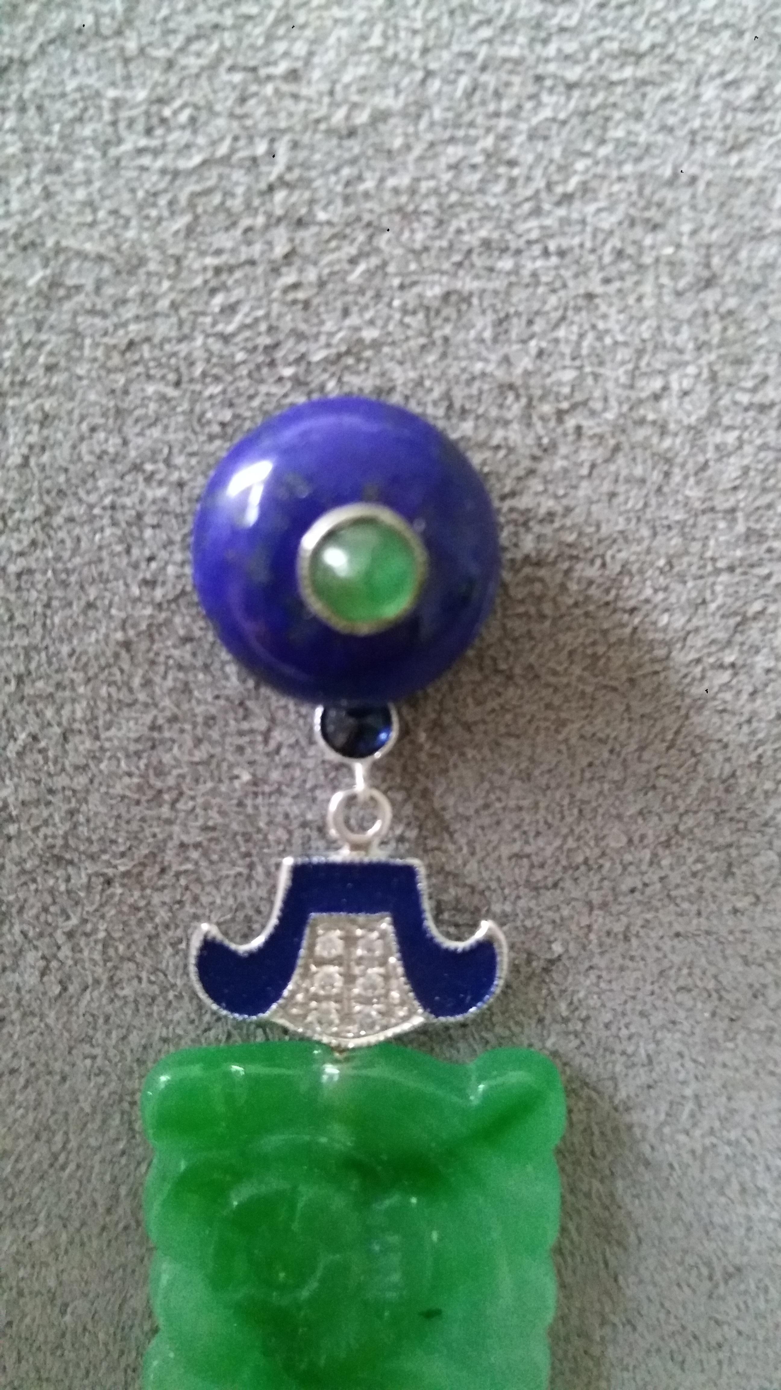 Lapis Lazuli round button tops with round emerald cabs in the center,middle parts in white gold,small blue round sapphires ,white gold, 12 small round full cut diamonds,blue enamels,2 carved Burma Jades rectangle shape
Length 65 mm
Width 16