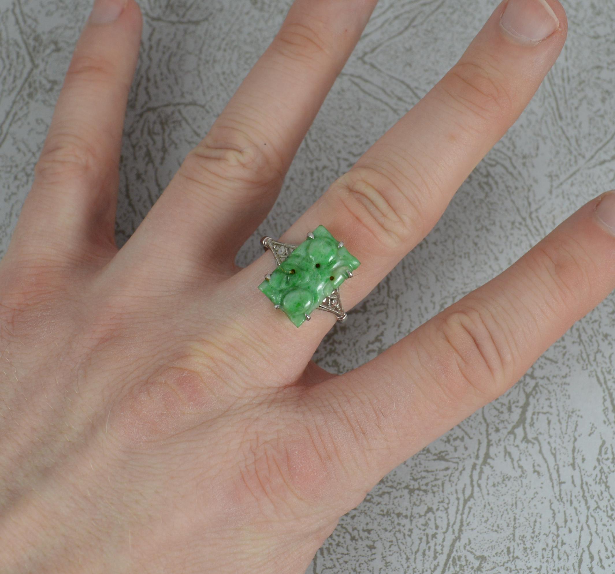A superb Jade panel ring circa 1930.
Solid 9 carat white gold shank and setting.
9.8mm x 15.4mm jade panel approx.

CONDITION ; Excellent. Well set stone. Strong and clean band. Crisp design throughout. Issue free. Please view photographs.

WEIGHT ;