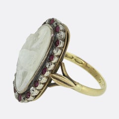Art Deco Carved Moonstone Ruby and Diamond Apollo Ring