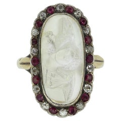 Art Deco Carved Moonstone Ruby and Diamond Apollo Ring