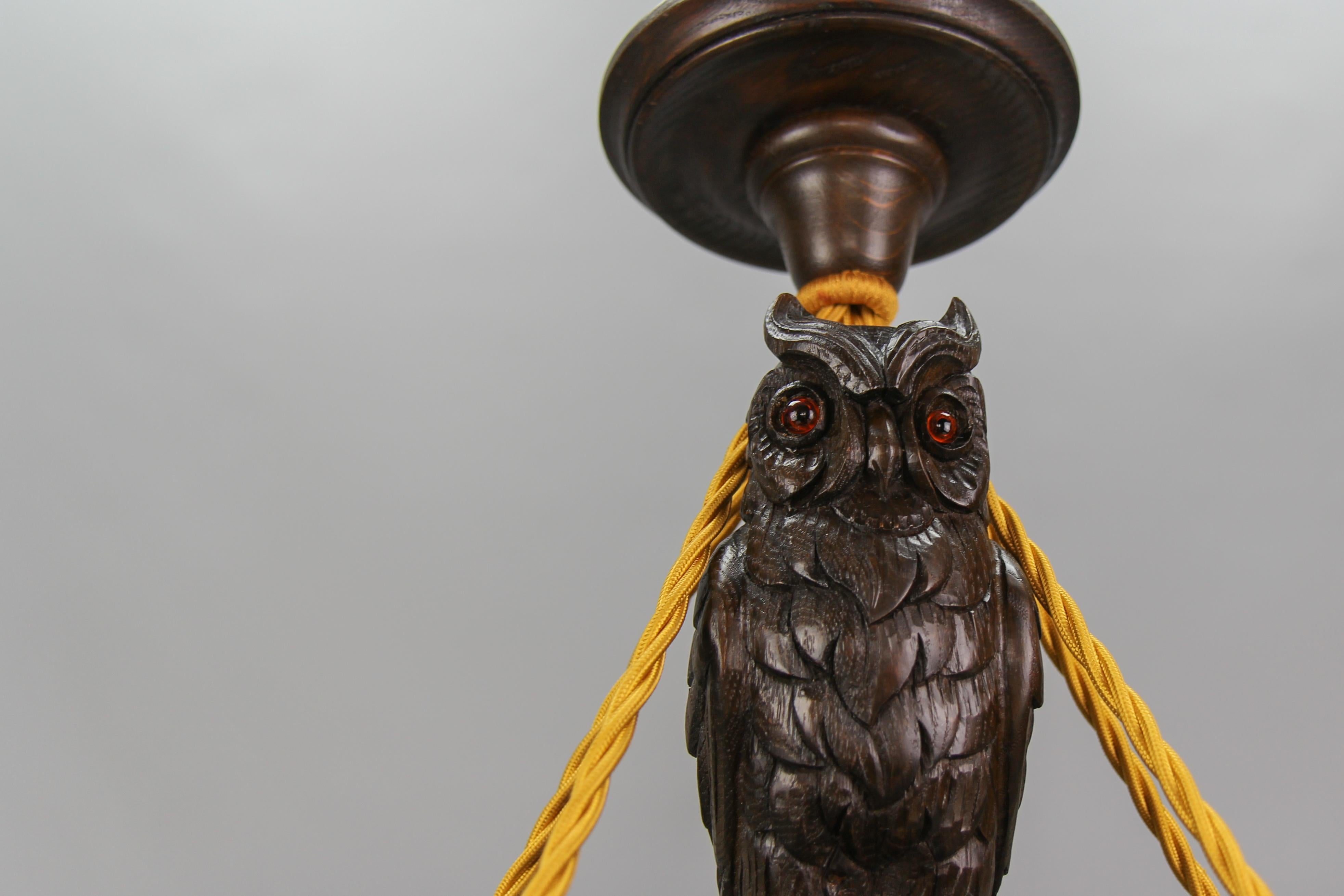 German Art Deco Carved Oakwood and Alabaster Five-Light Chandelier with Owl Figure For Sale