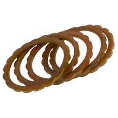 Art Deco Carved Orange and Brown Bakelite Spacer Bracelet, Lot of 5 Bangles