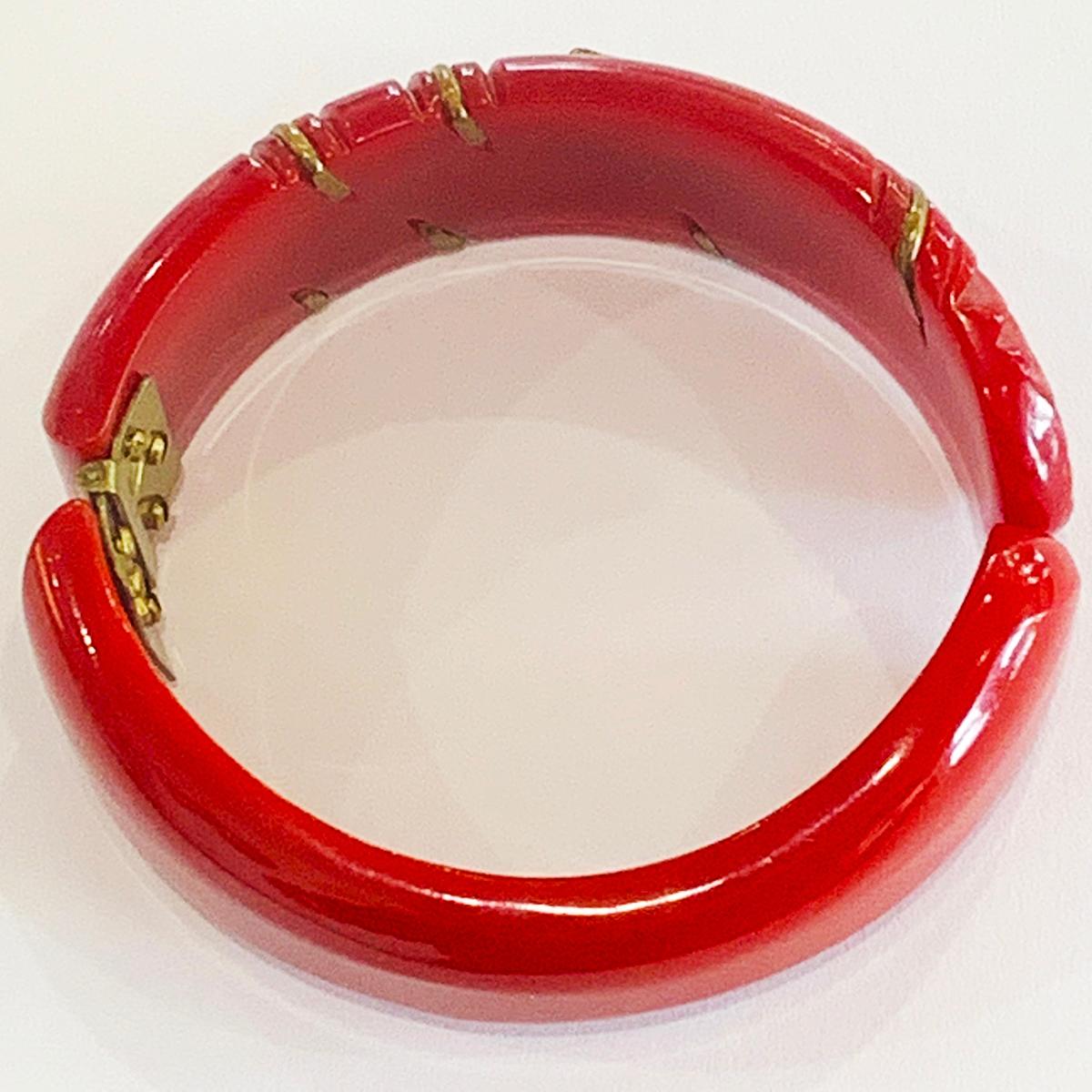 Women's or Men's Art Deco carved red bakelite hinged bangle clamper with gilt bronze flowers