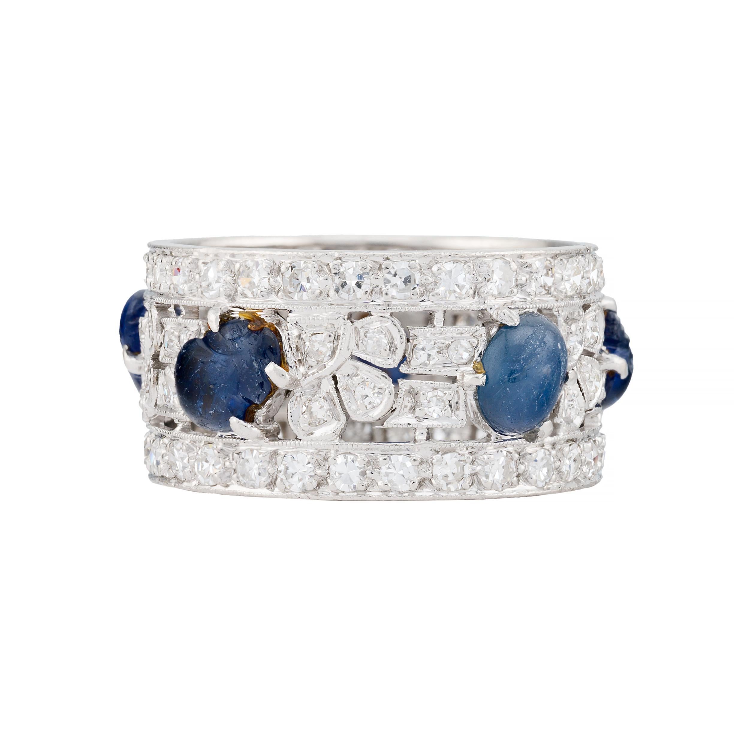 Aston Estate Jewelry Presents:

An exquisite art deco ring featuring carved blue sapphires in the form of scarabs with a total carat weight of 3.75.

Sapphires are No Heat.

Accentuating the sapphires are round cut diamonds weighing 1.3 carats,