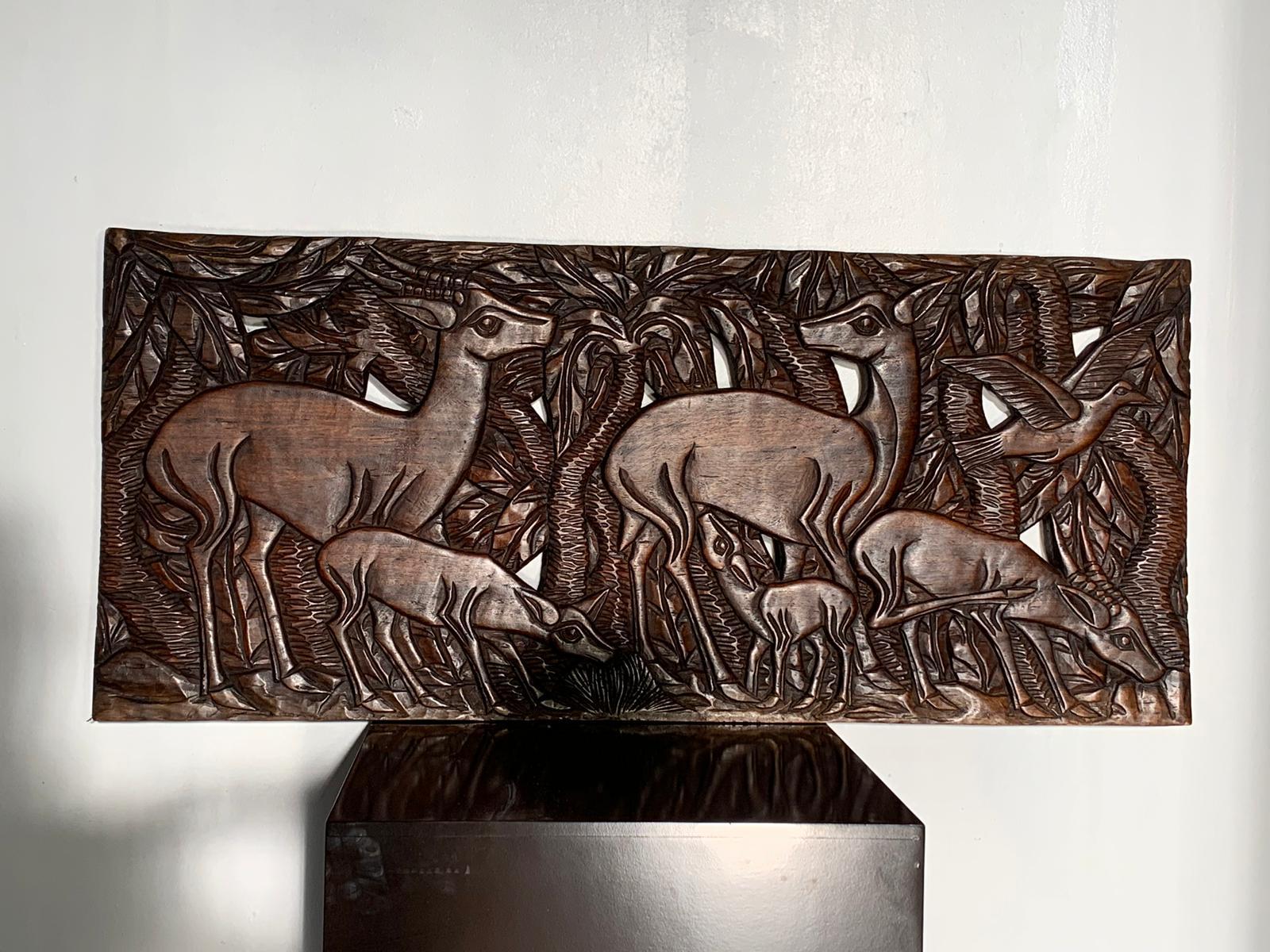Decorative panel in walnut wood carved single board, Art Deco style, tropical forest theme France 1930.