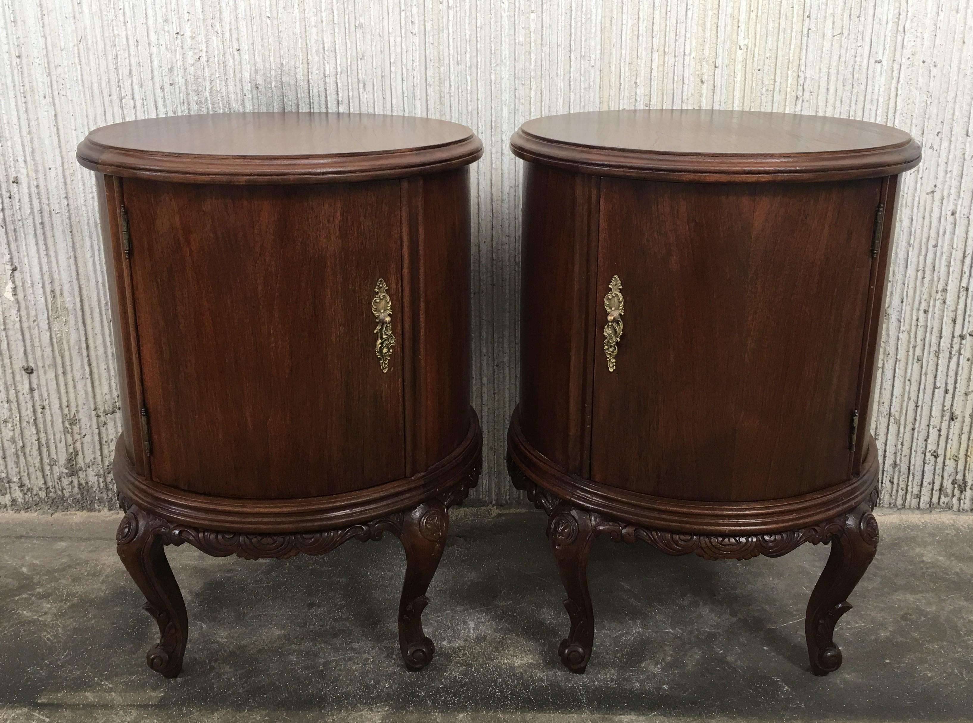 Pair of marquetry nightstands with metal crest one drawer and one compartment of ceramic.
Originals handles and garniture.

Measures: Height to the table 30.75 in
Total Height 39.75 in.
 
