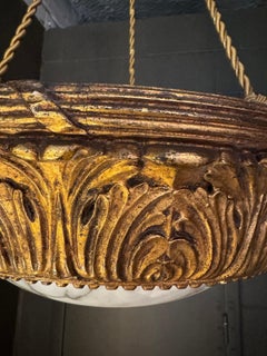 Lustre Art Deco en bois sculpté et albâtre