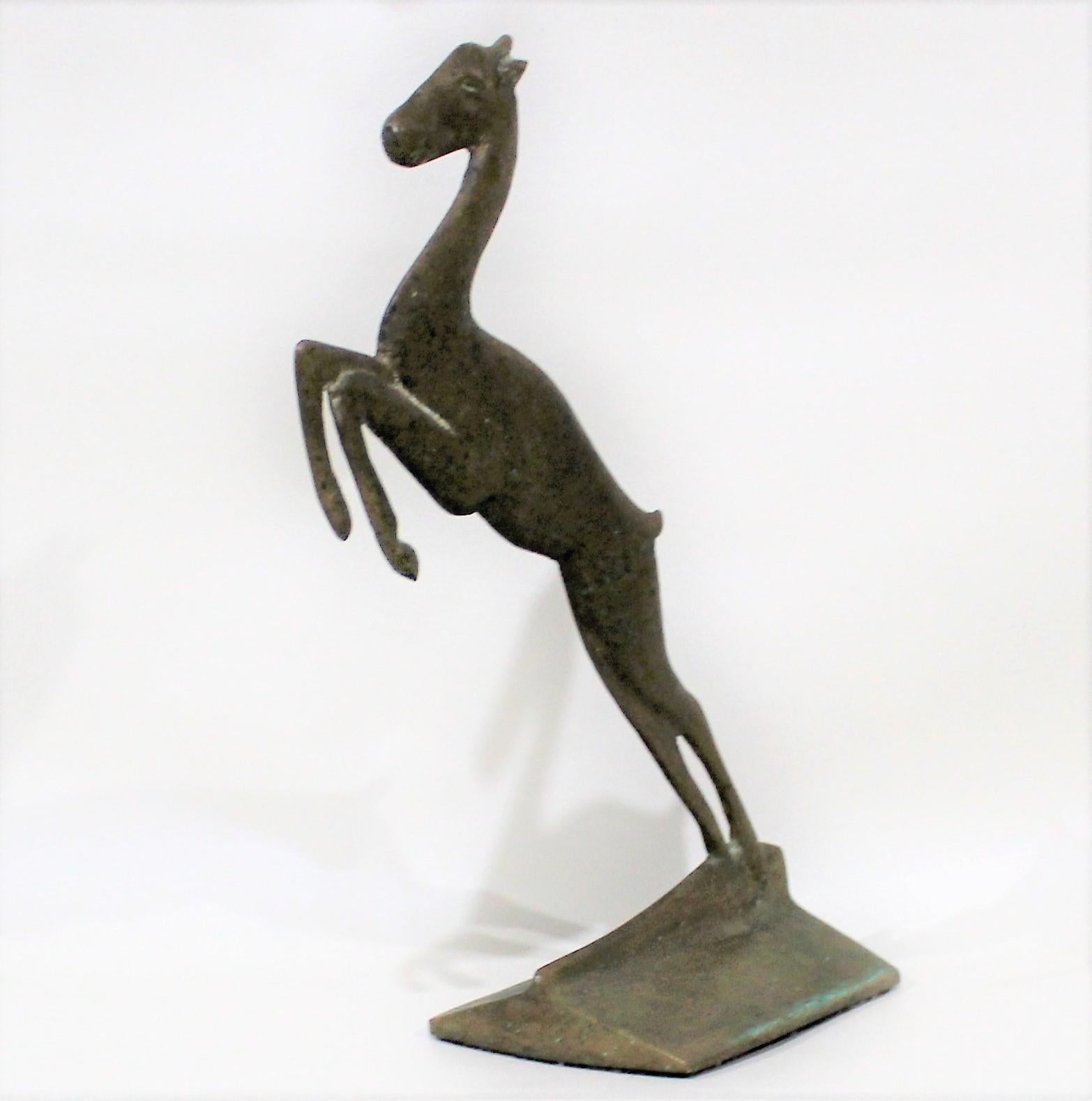 Jumping doe Art Deco doorstop in cast brass with beautiful rich patina.