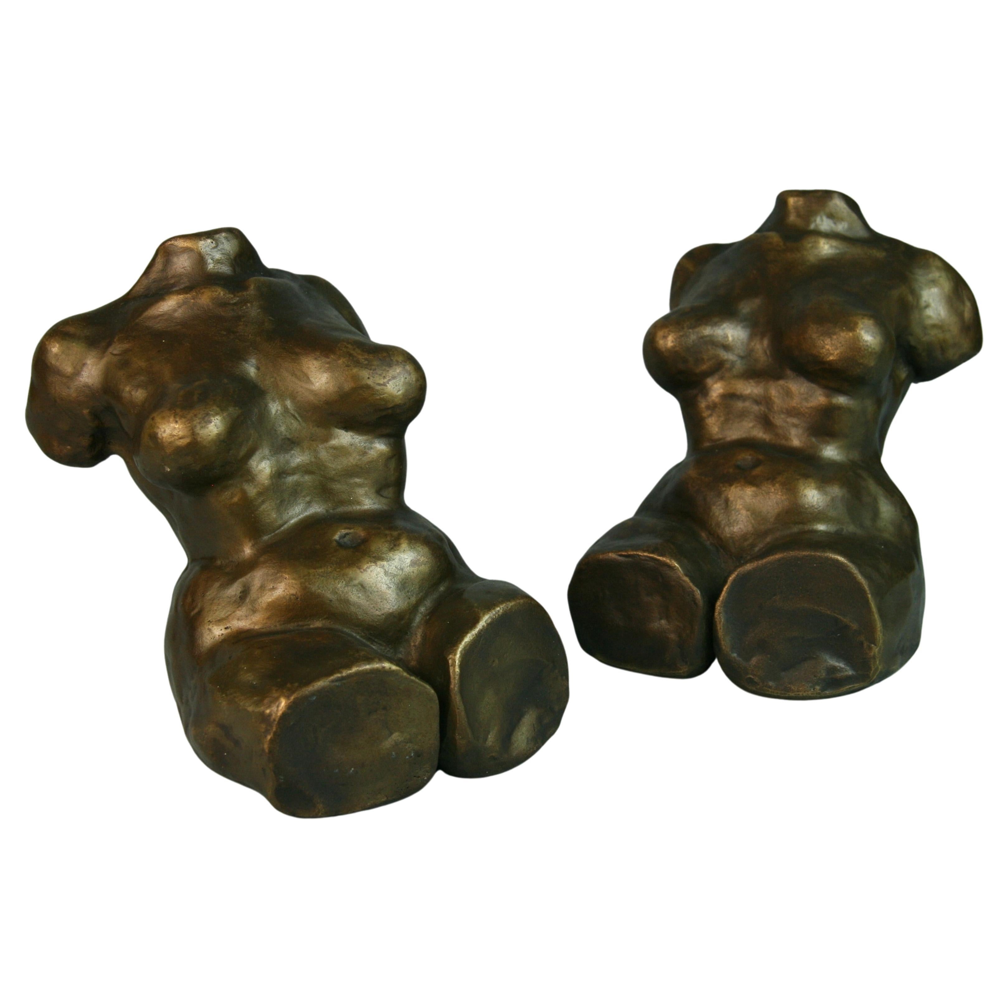 Sculptures/ serre-livres Art Déco en bronze coulé représentant des nus coulés