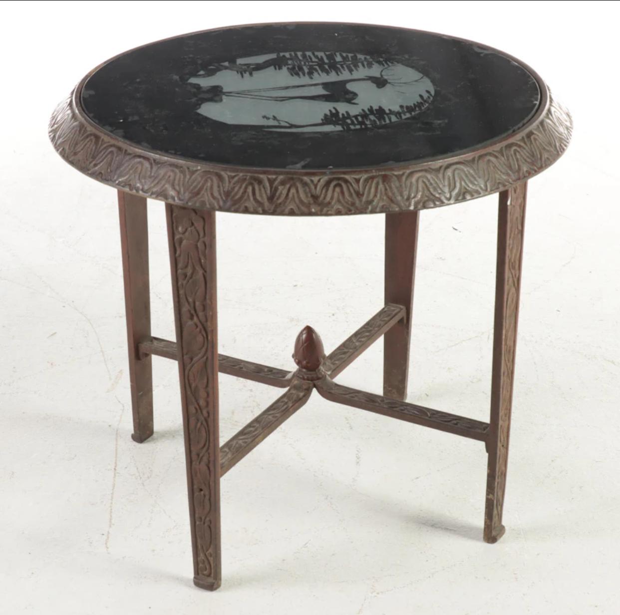 Art Deco Cast Iron and Vitrolite Black Cut To Clear Glass Top Table In Good Condition For Sale In Chicago, IL