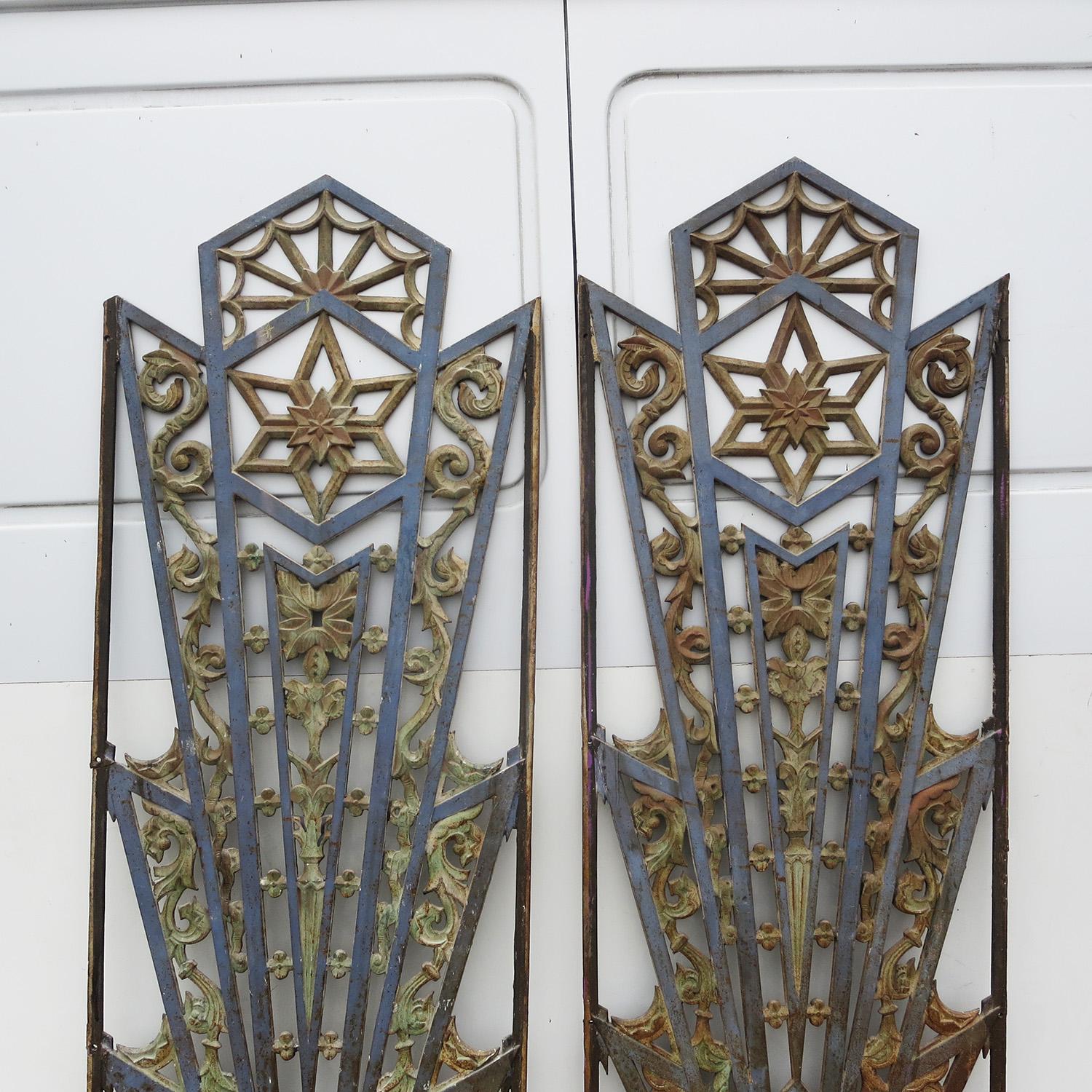 These incredible grates came off of a Los Angeles area building from the 1930s. They show a wonderful overall patina in a two toned finish. Each grate has flat bars on the left and right with mounting holes for easy installation. They can be used in