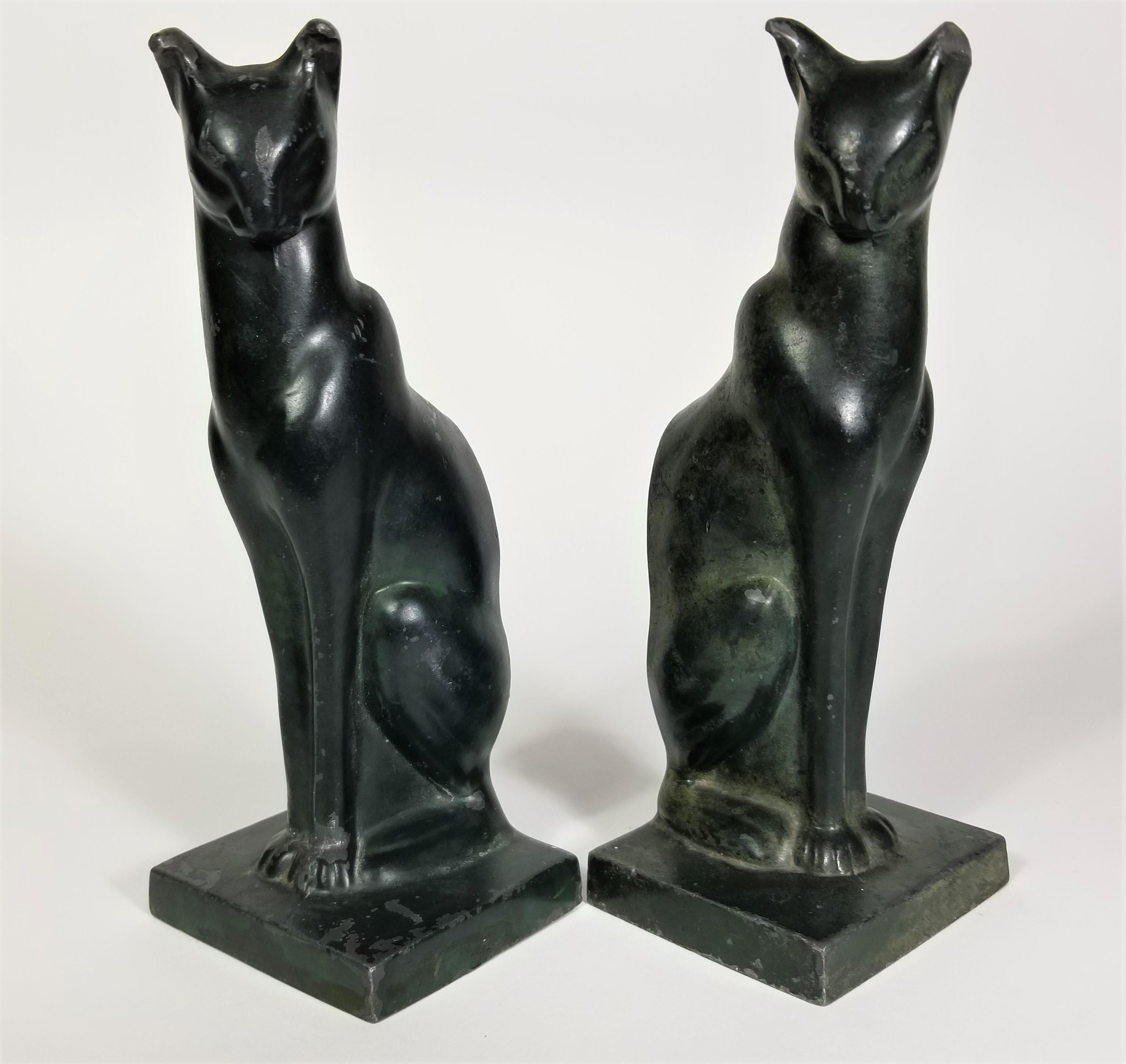 Pair of Art Deco cast iron Siamese Cat bookends.