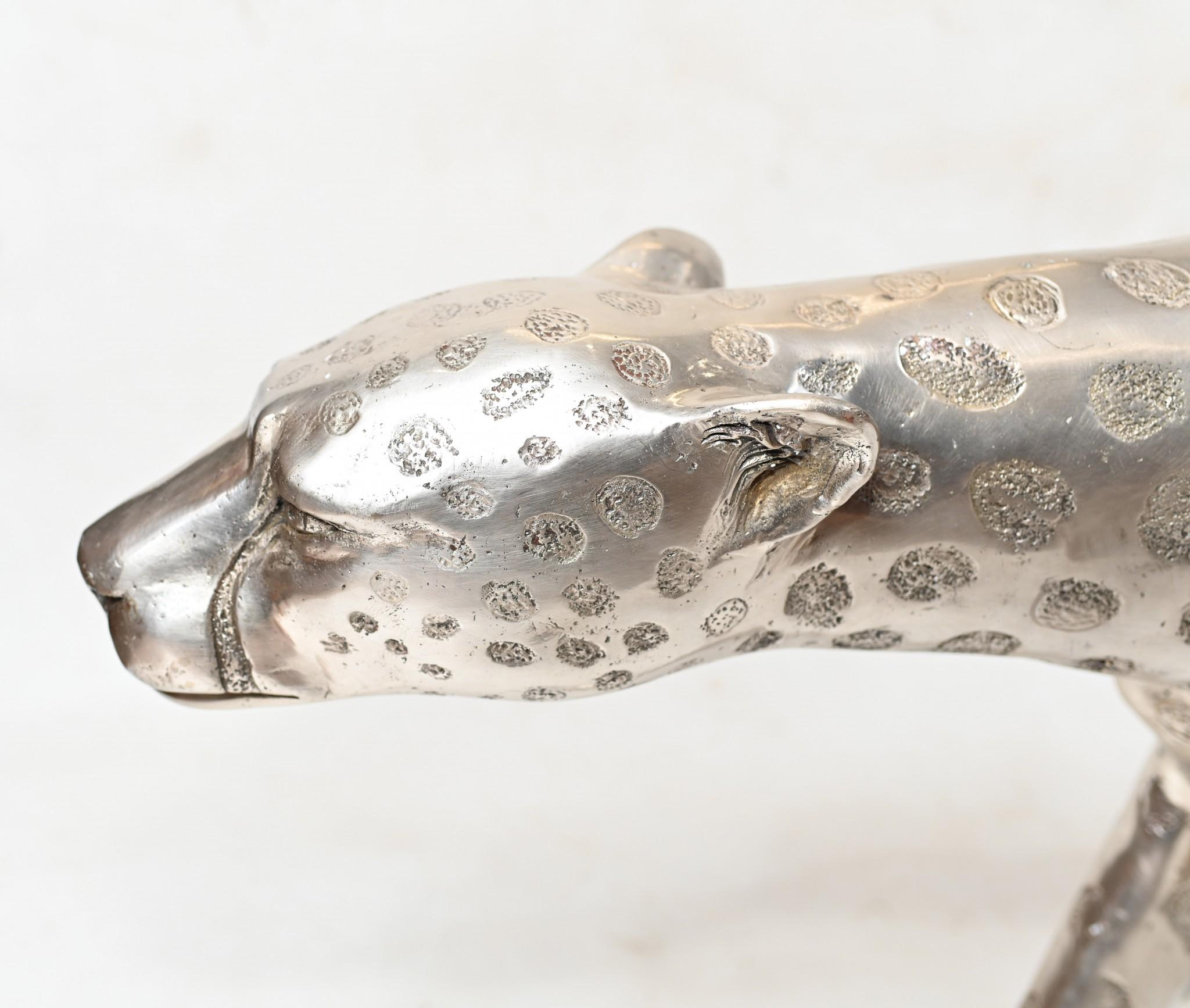 Gorgeous bronze casting of a large silver bronze cheetah in the Art Deco style
Casting is superb, look at how the creatures spots have been rendered 
Artist has really captured the beauty and poise to the creature with great skill
Offered in
