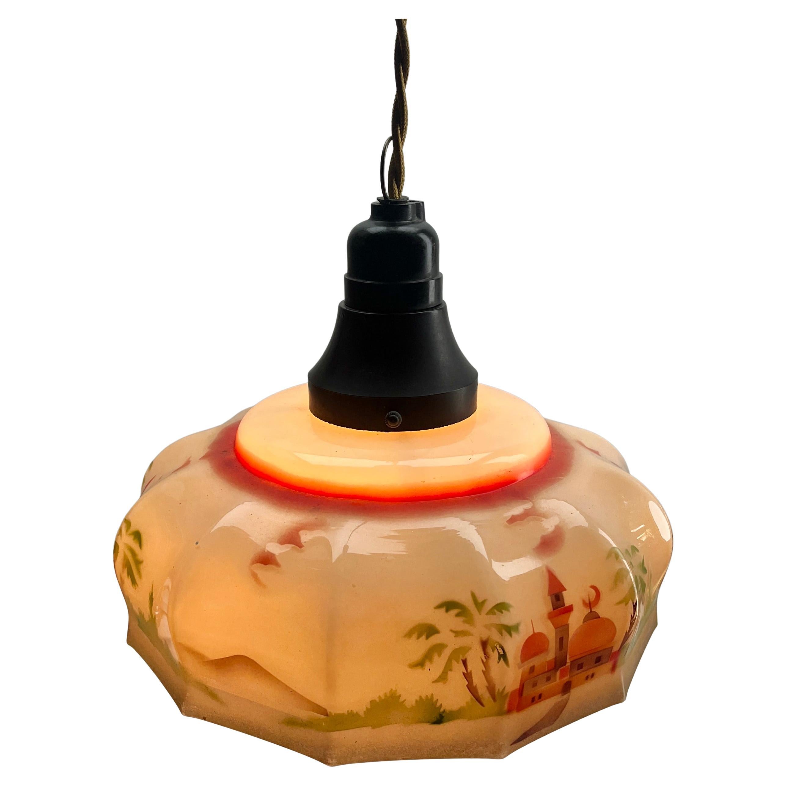 Art Nouveau ceiling lamp
Photography fails to capture the simple elegant illumination provided by this lamp.

Fitting Bakelite pendant ceiling light with screw fixing to hold a stylish Belgian Art Deco lampshade. 
Good distribution of darker and