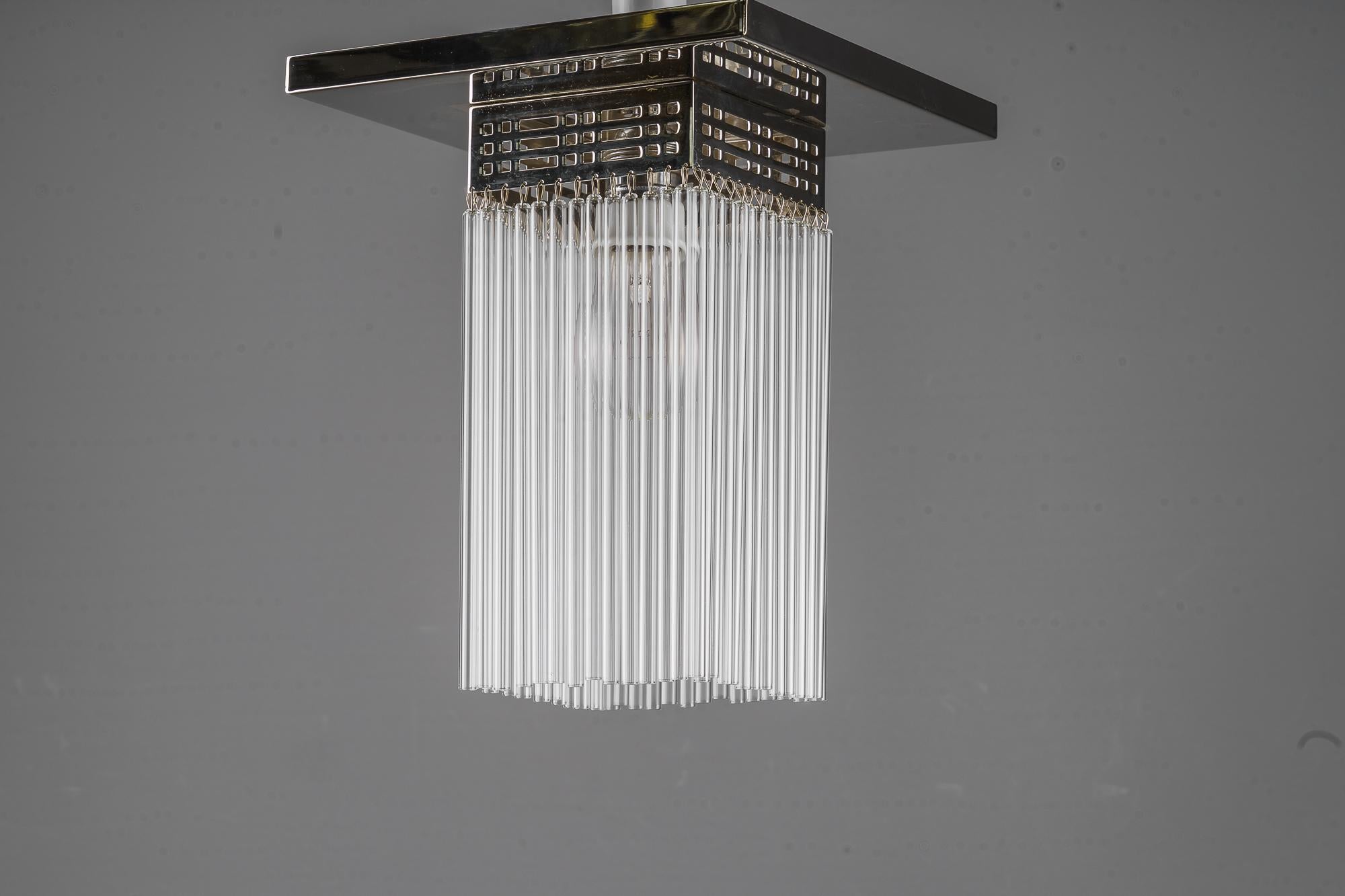 Art Deco ceiling lamp nickel - plated with glass sticks around 1920s
The glass sticks are replaced ( new )