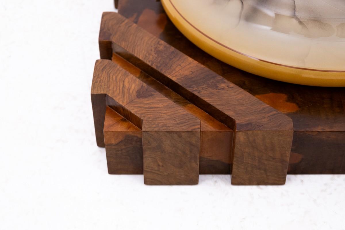 Art Deco ceiling lamp, Poland, 1950s.

Very good condition, after professional renovation and replacement of electrical elements.

wood: walnut

dimensions: height 17 cm width 57 cm depth 57 cm

